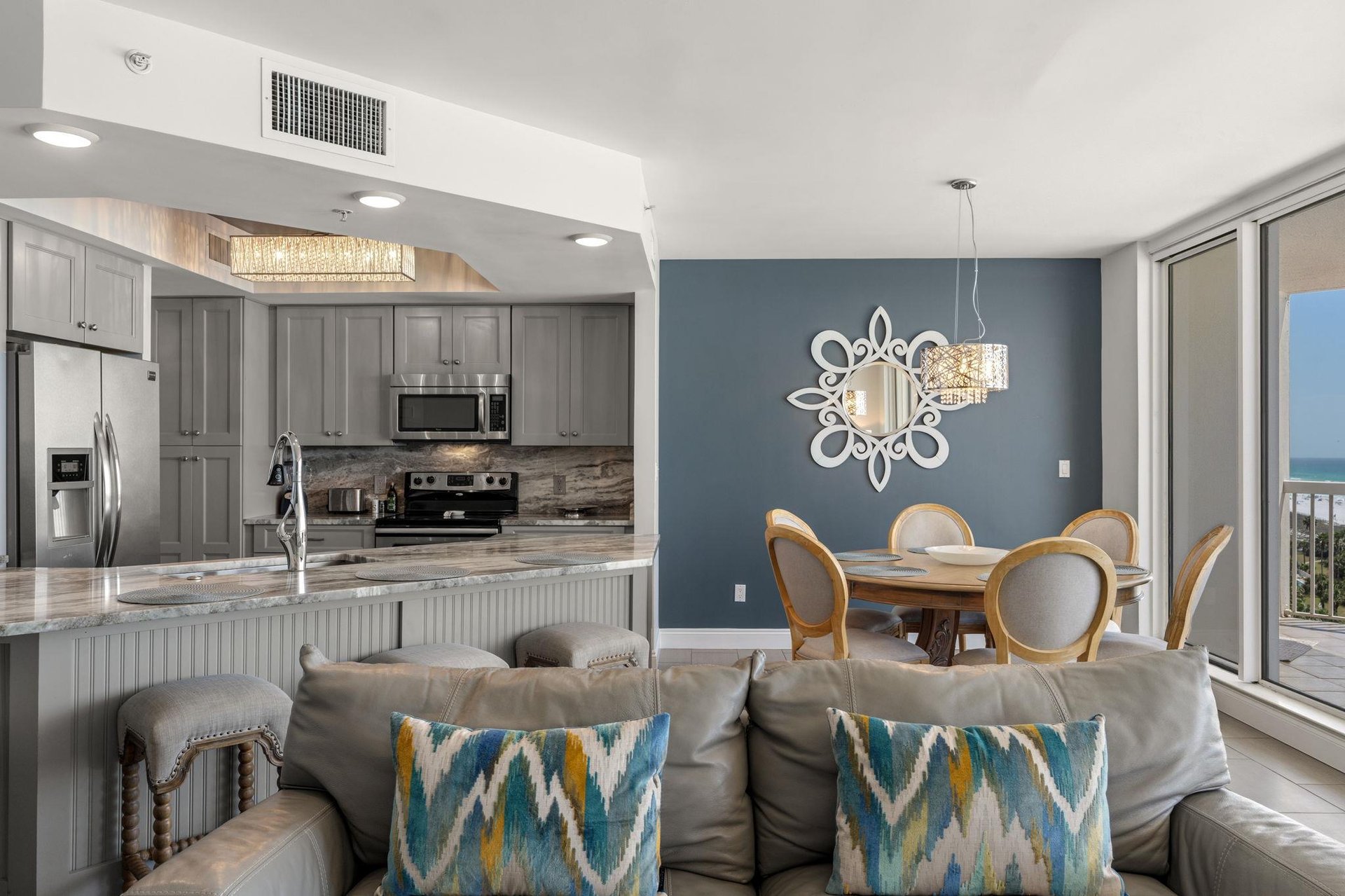 Enjoy an openplan living space where elegant décor meets coastal comfort, complete with ocean views from your private balcony.