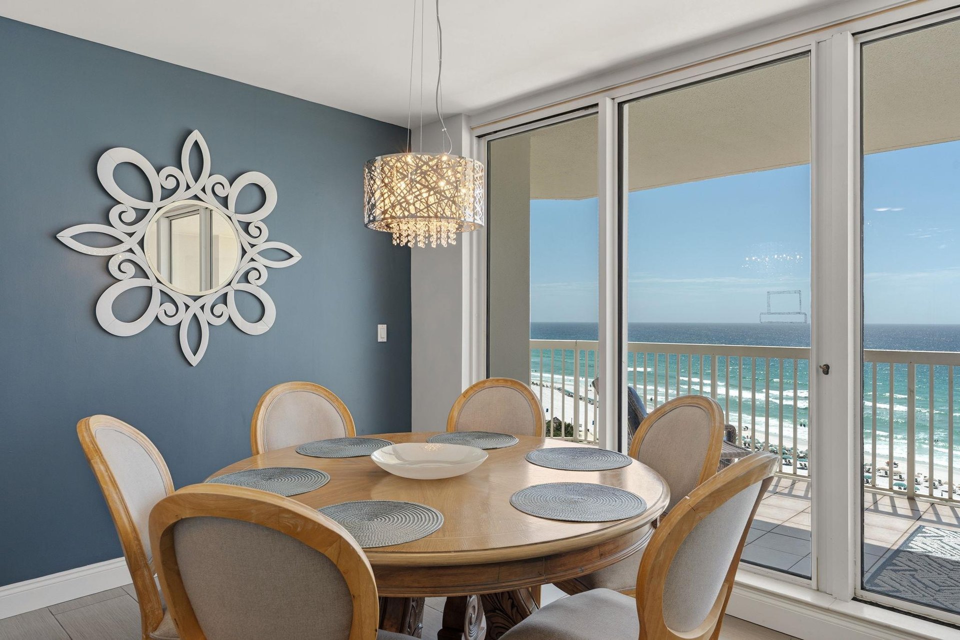 Your dining room opens to stunning ocean views, where elegant meals await at your beachfront table.