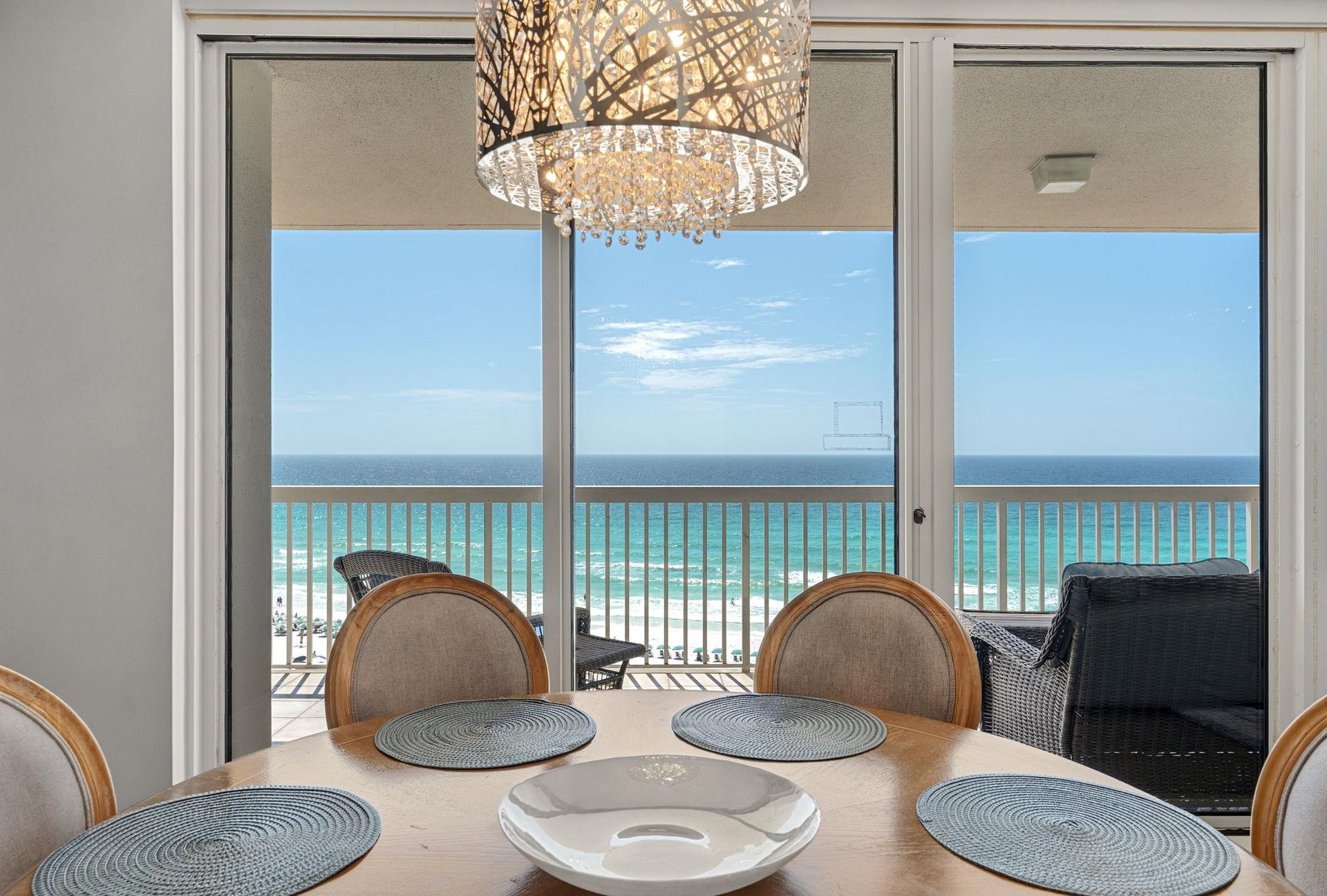 Dine with stunning ocean views where elegant lighting creates the perfect ambiance for memorable meals.