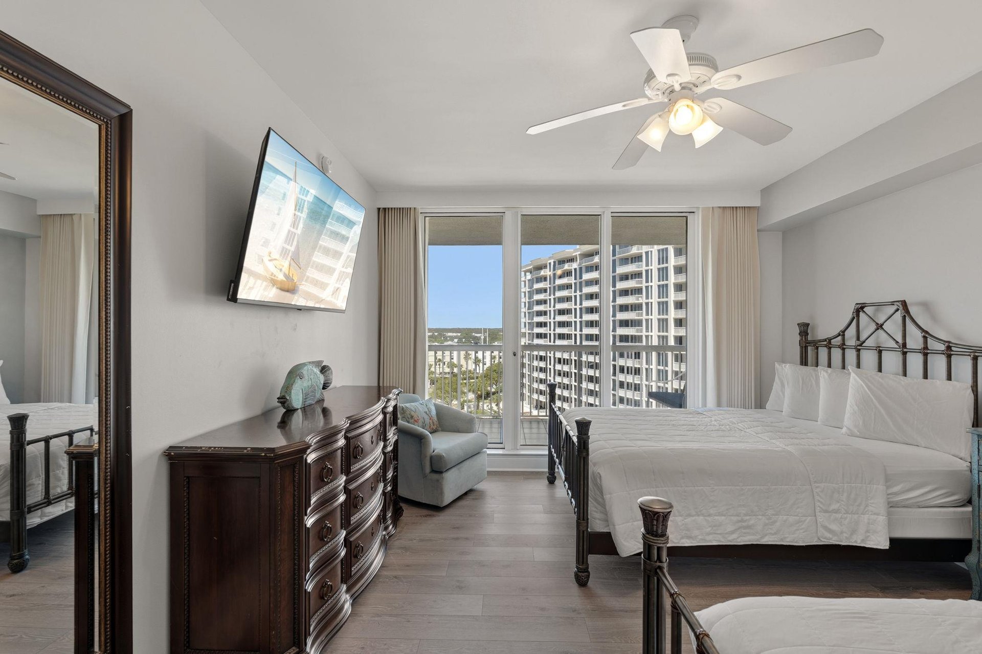 Relax in this elegant bedroom with city views, modern amenities, and comfortable twin beds perfect for your getaway.