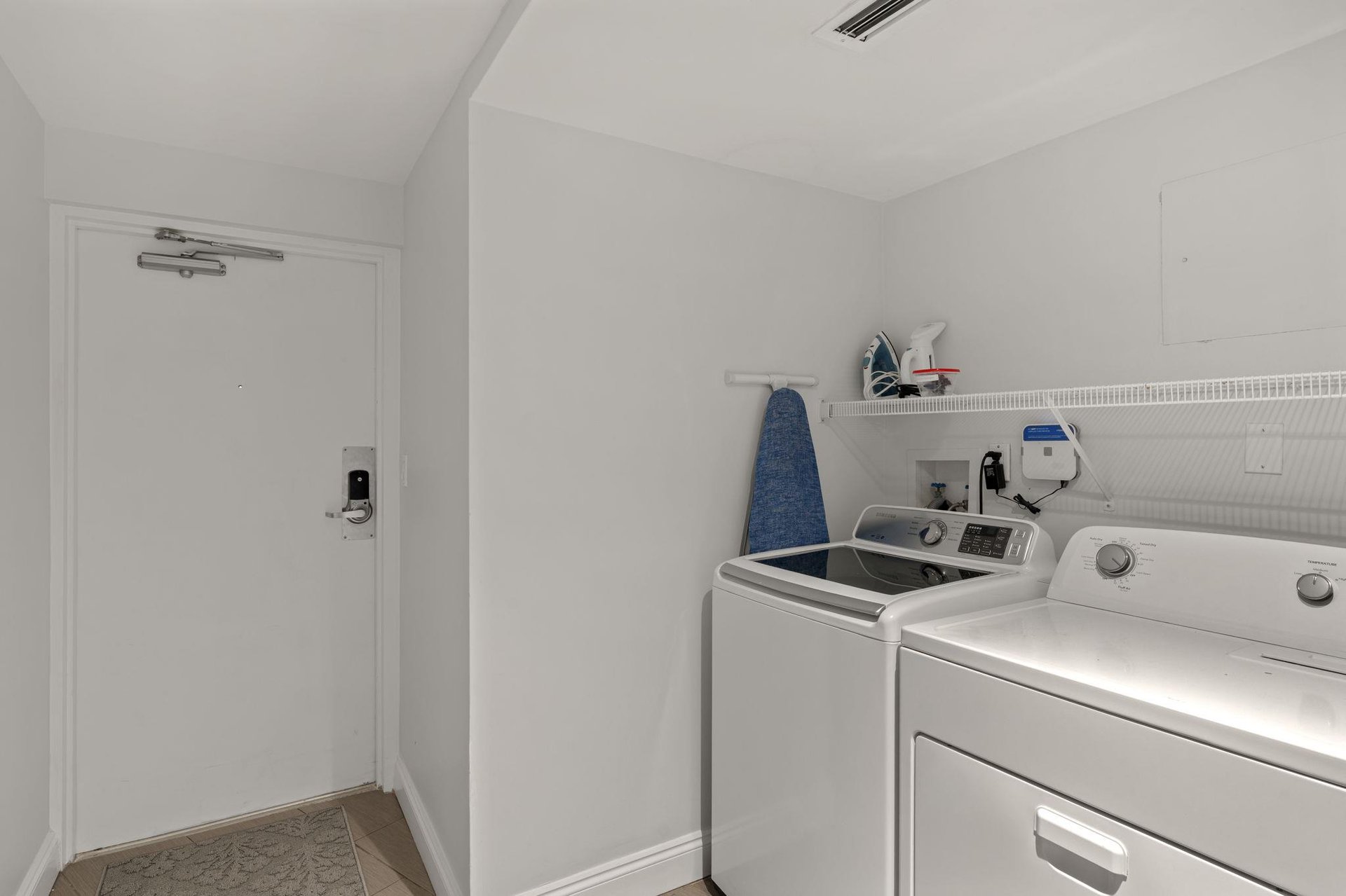 Your dedicated laundry room makes extended stays effortless with a fullsize washer, dryer, and convenient ironing station.