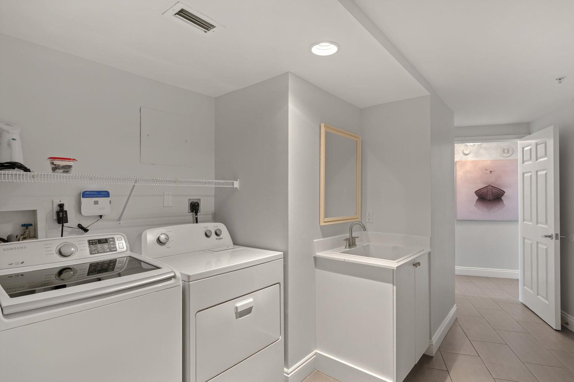 Your bright, dedicated laundry space makes staying fresh effortless with fullsize washer and dryer plus convenient utility sink for all your needs.