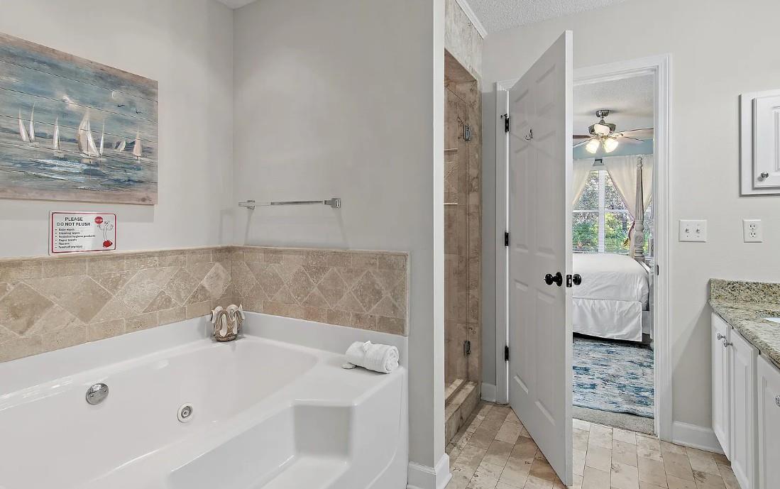 Bathroom 1  Unwind in your private spalike retreat with a luxurious soaking tub and elegant coastal touches throughout.
