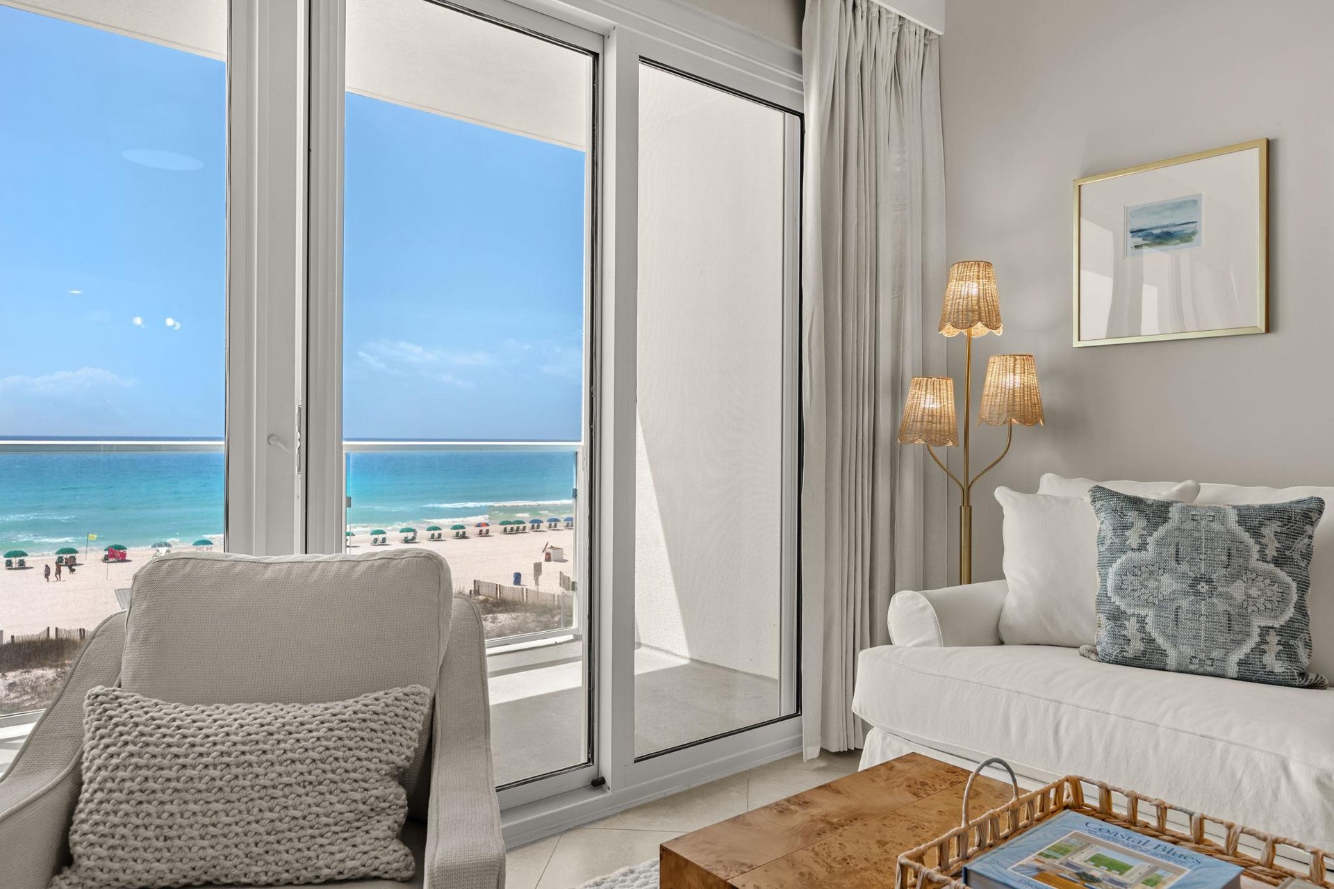 Unwind in your serene living space with breathtaking ocean views through floortoceiling windows.