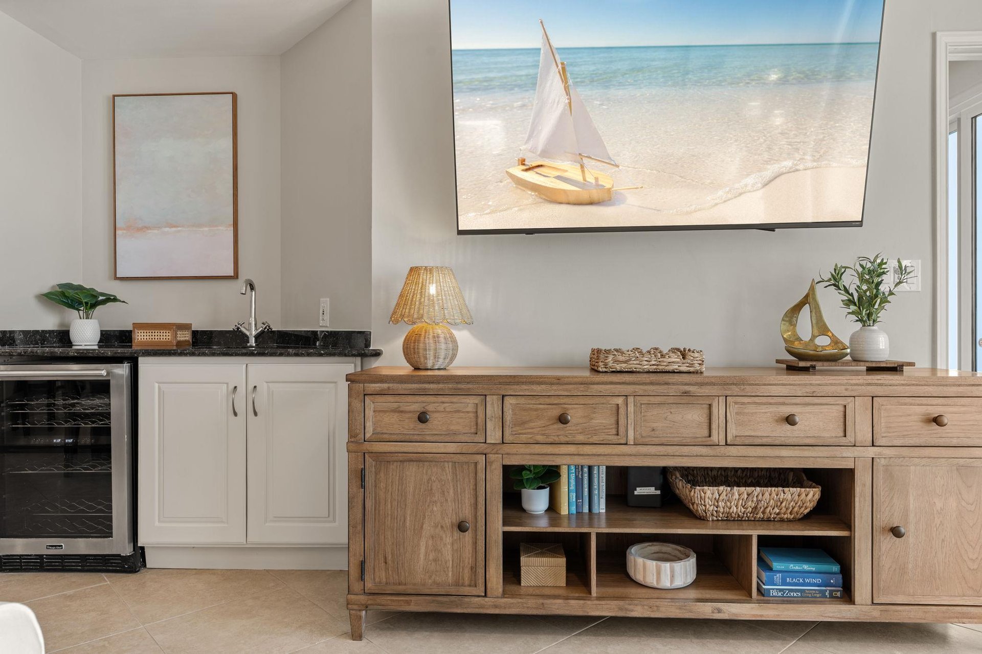 Comfortable coastalthemed retreat is ready for your vacation.