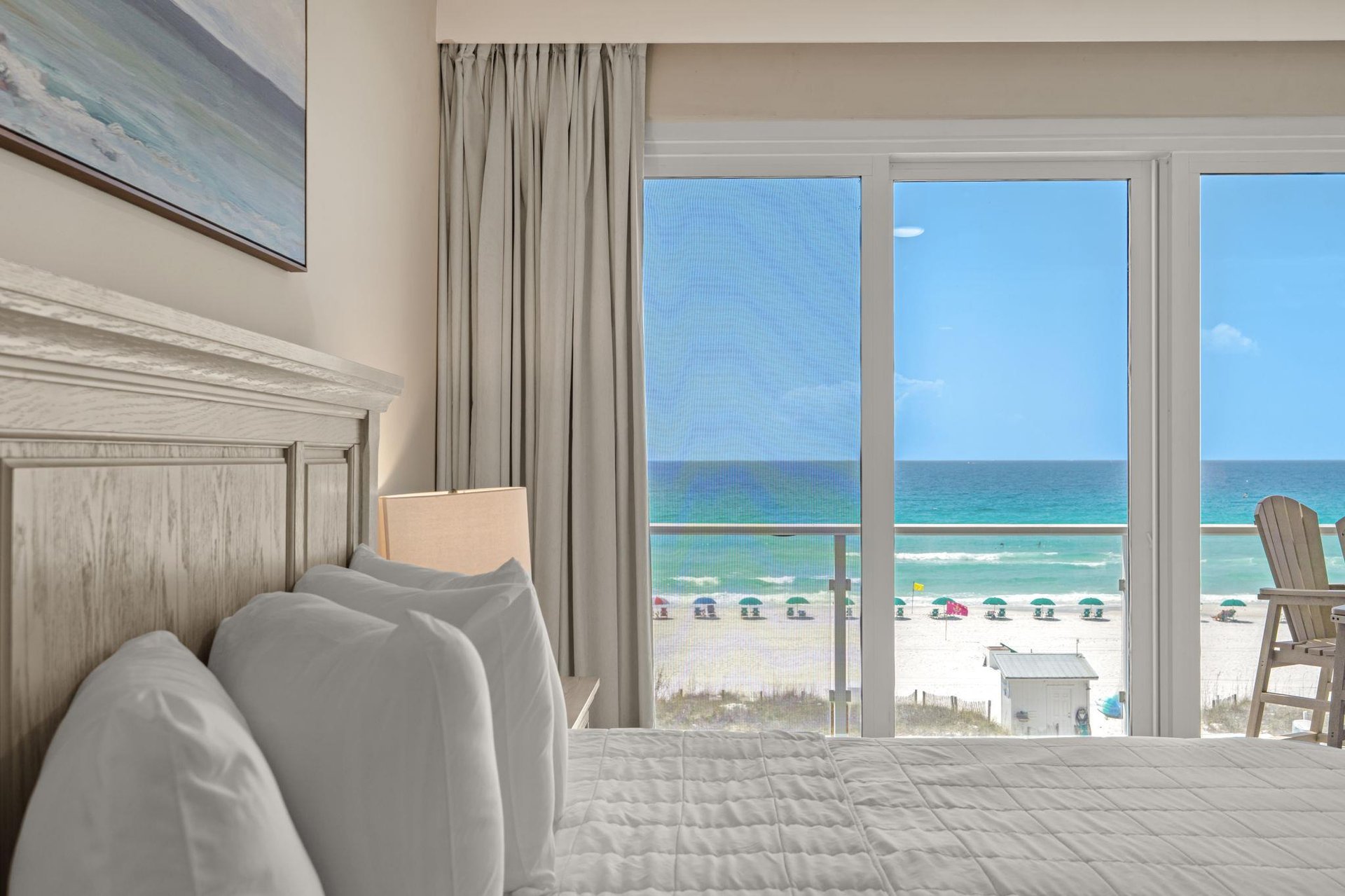 Bedroom 1 with plush king bed and perfect water view.