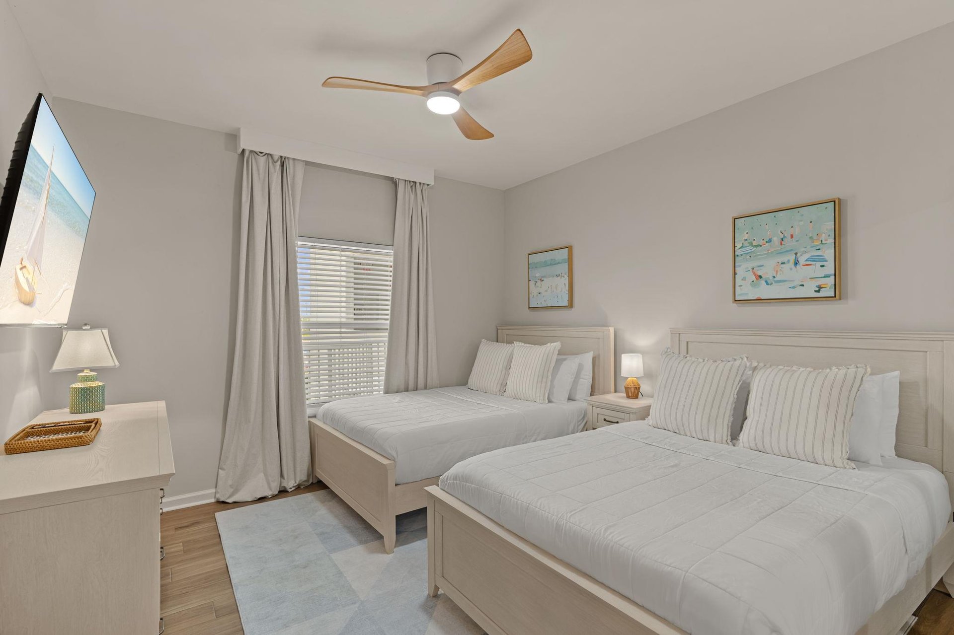 Bedroom 2 where youll wake up refreshed in this coastalthemed bedroom with two comfortable beds.