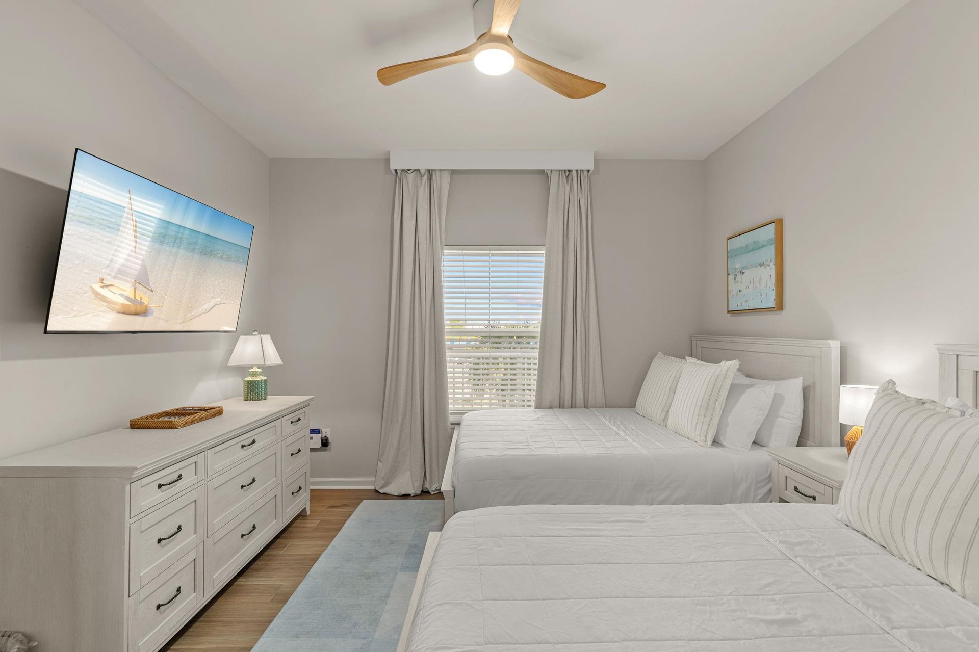 Sleep peacefully in your coastalinspired bedroom with 2 double beds.