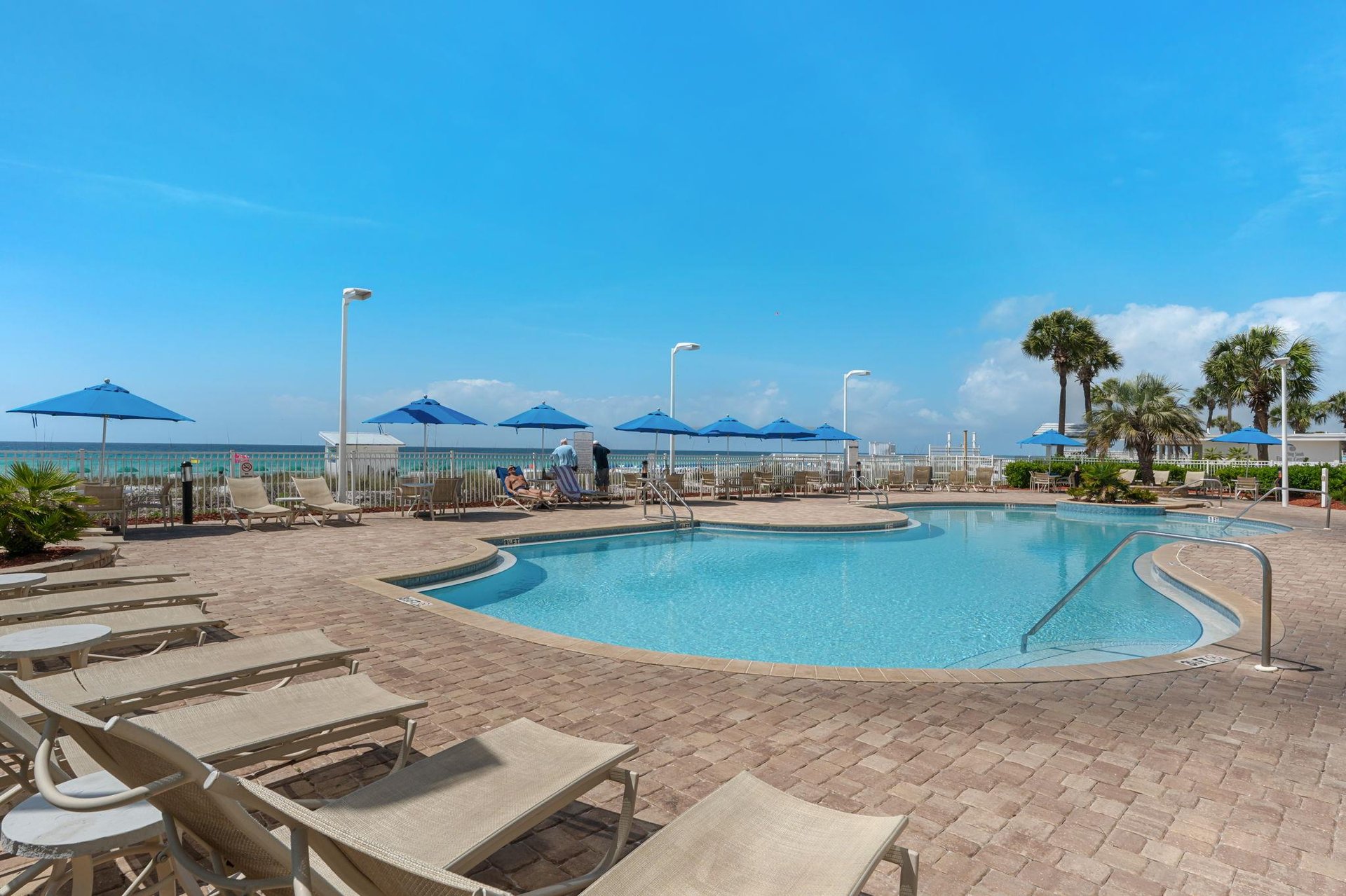 Soak up sunshine by your private pool with crystalclear waters and comfortable loungers, all steps from pristine beaches.