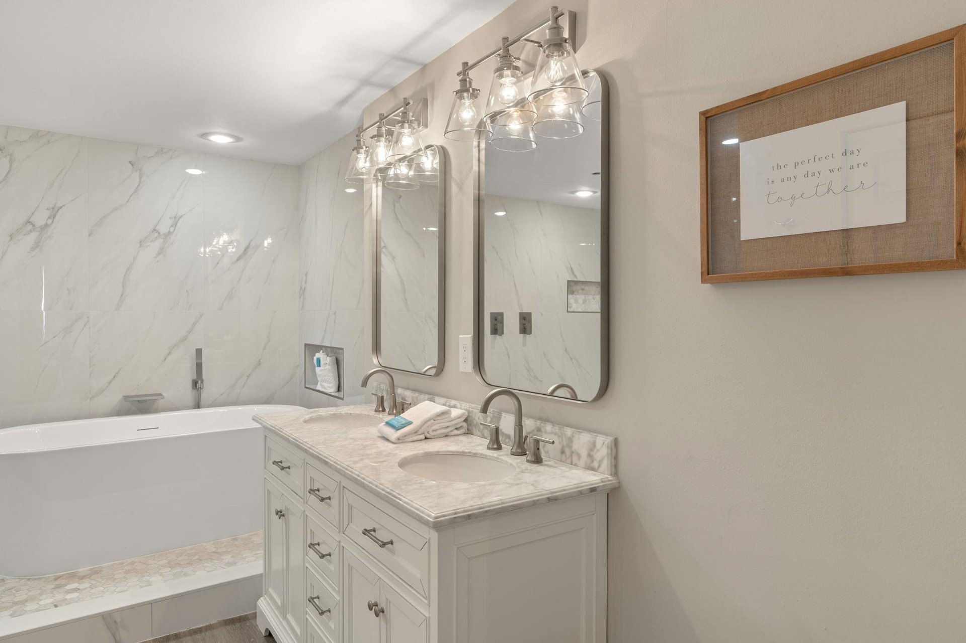 Step into your spalike bathroom with marble counters and a luxurious soaking tub.