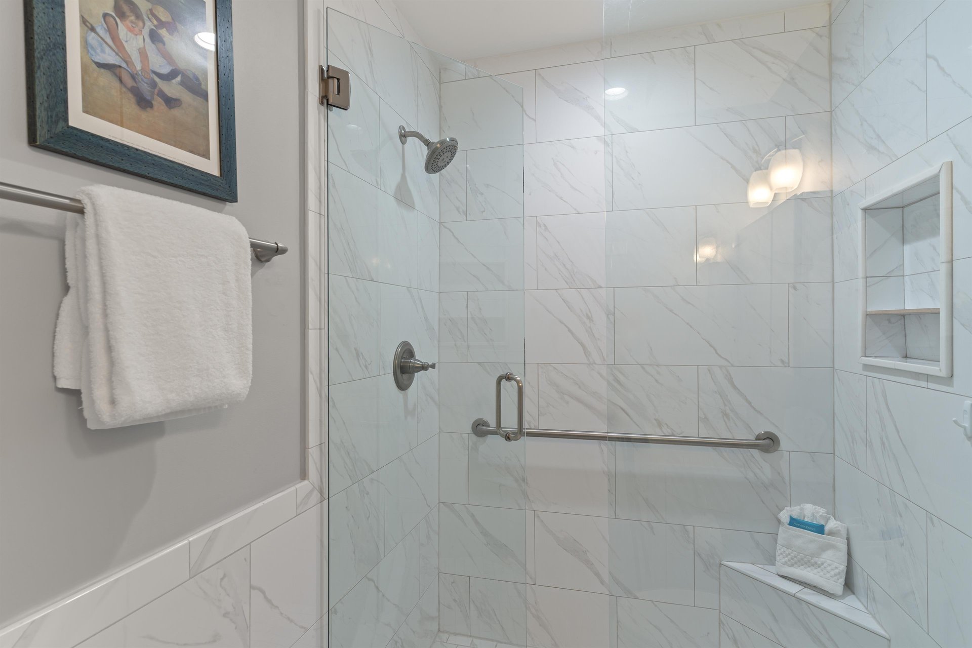 Bathroom 1 walkin shower and convenient shower bench