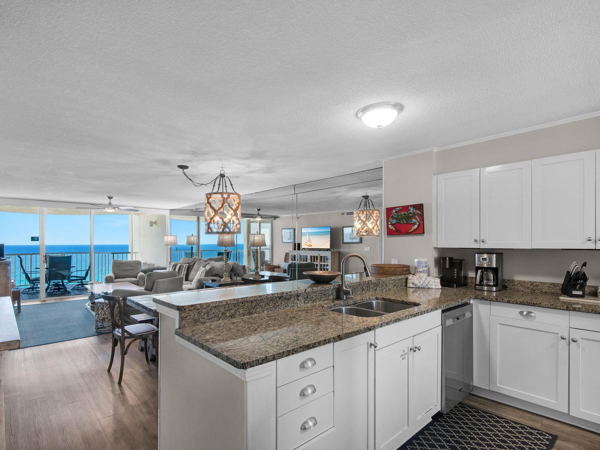 Your openconcept kitchen with sweeping ocean views just beyond the living area.