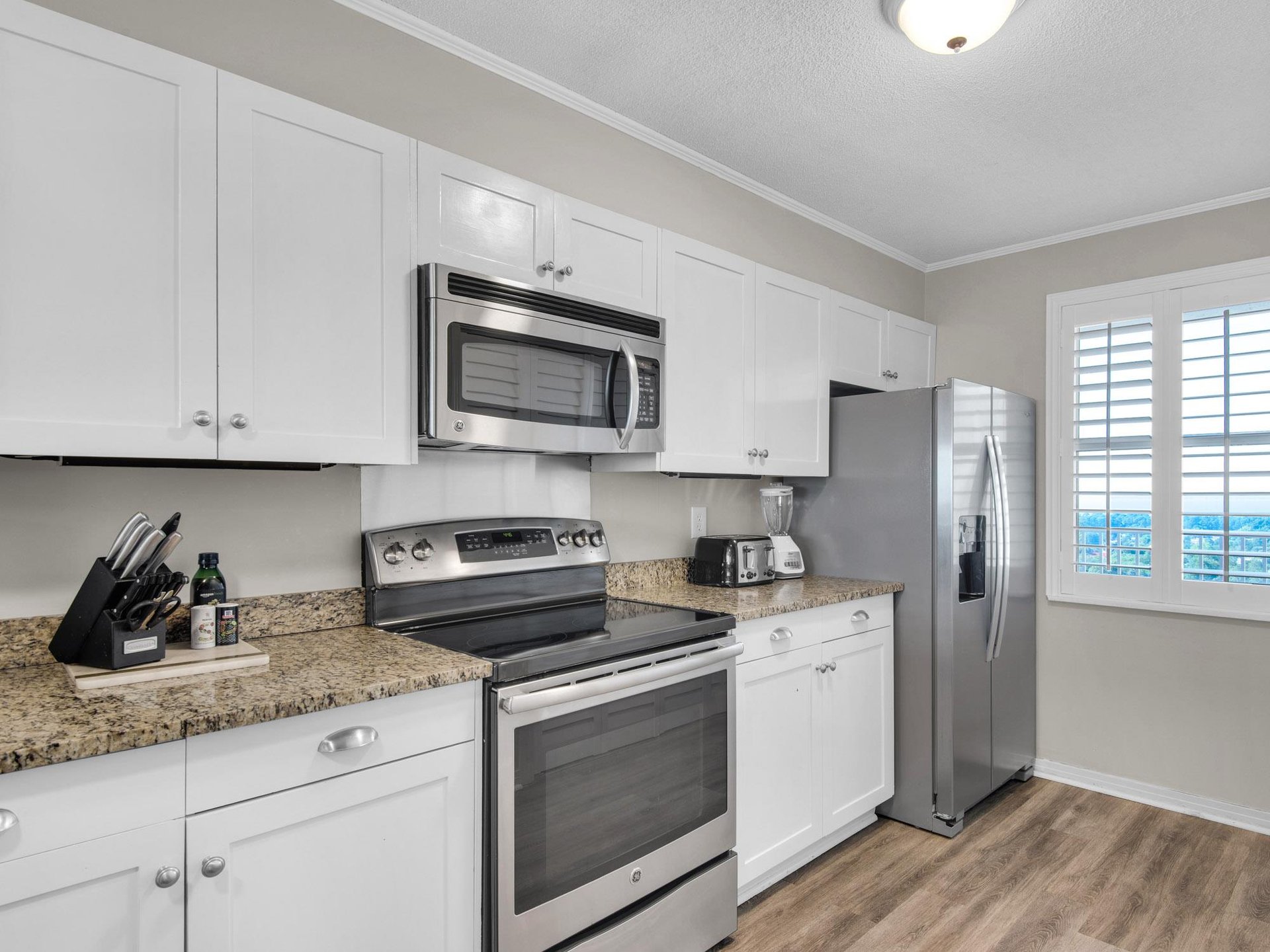 Natural light and modern touches make cooking a pleasure in this kitchen.