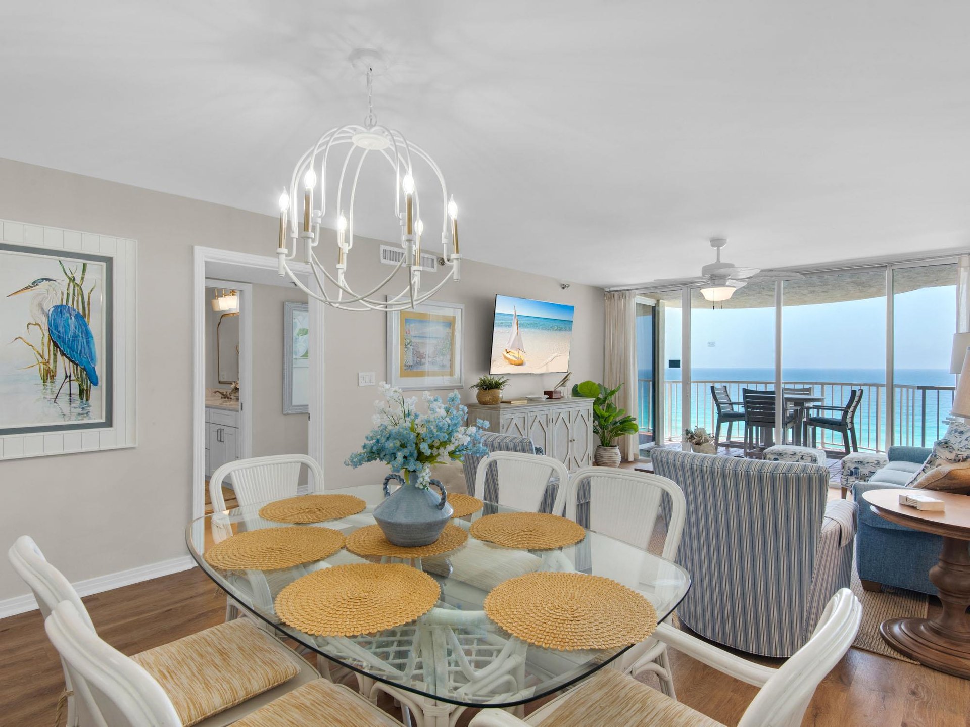 Gather for meals in this bright, coastalstyled dining area with stunning gulf views