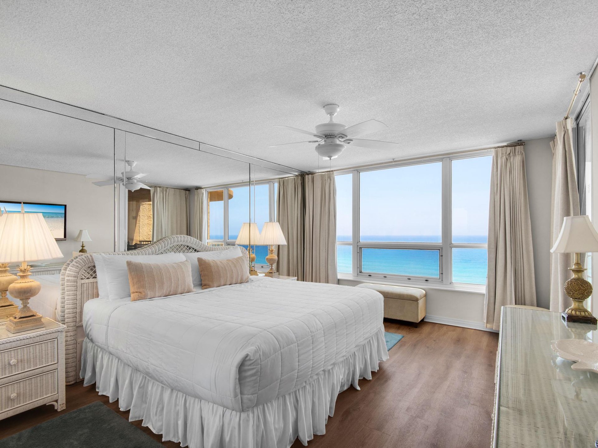 Your serene primary bedroom features crisp linens, coastal décor, and a private gulf panorama that invites peaceful mornings and restful nights.