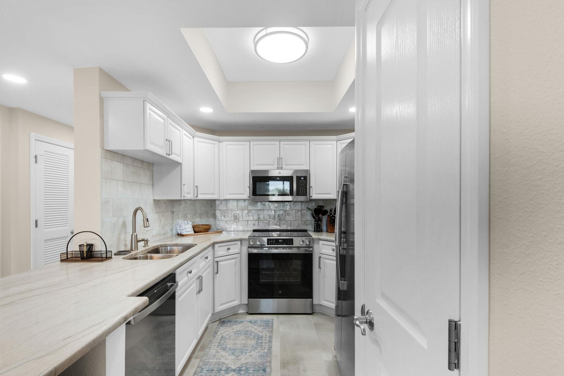 The gourmet kitchen sets the stage for delicious meals and cozy gatherings