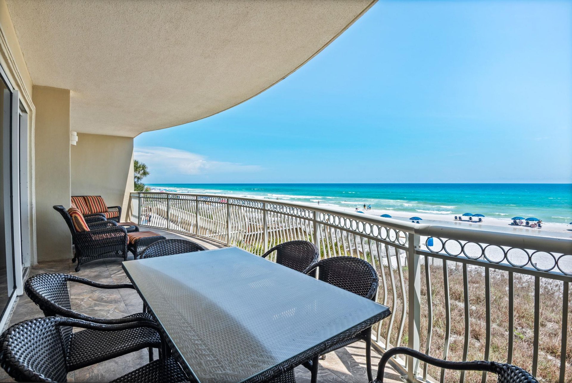 Step onto the balcony and breathe in the stunning turquoise water stretching endlessly before you—your perfect escape for morning coffee or sunset relaxation.