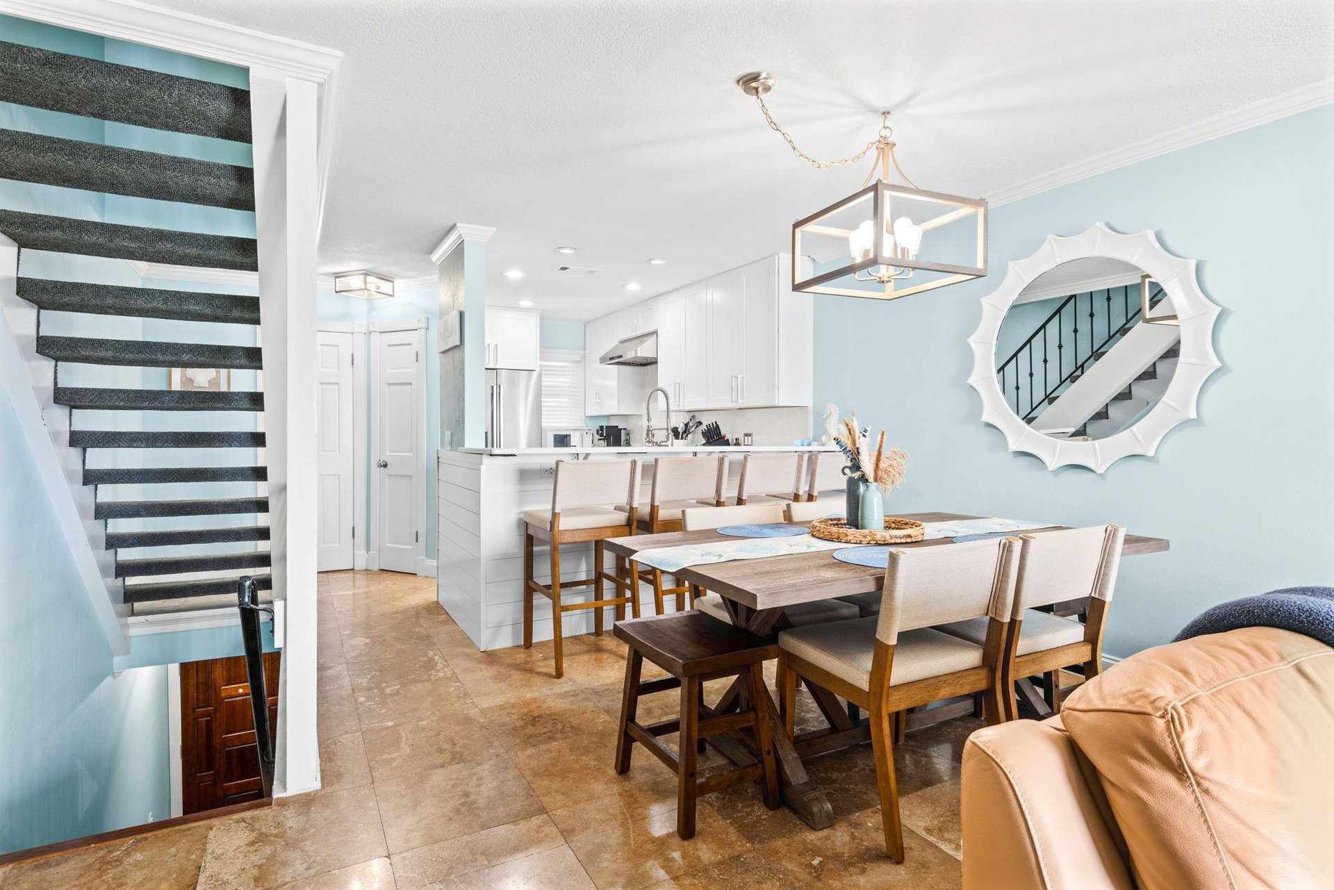 The openconcept living flows beautifully from the bright kitchen to elegant dining space.