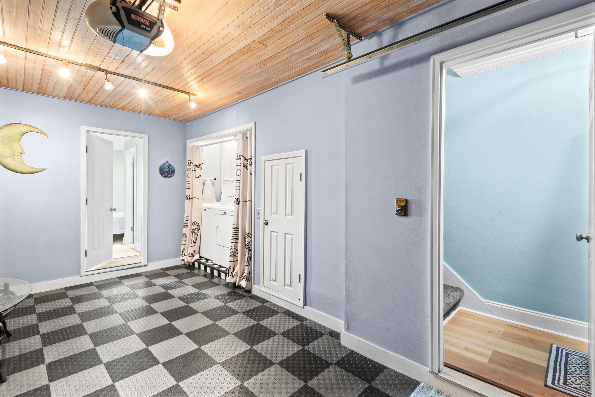 The Garage features convenient in unit Washer and Dryer and access to Bedroom 3