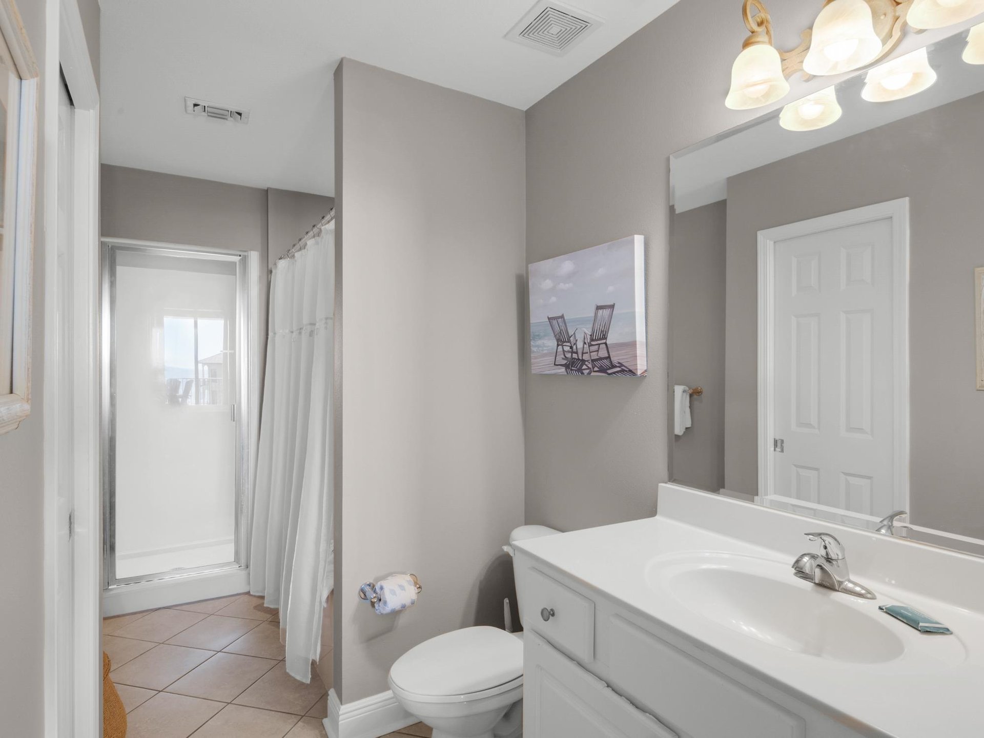 Your private bathroom features a refreshing shower, modern fixtures—everything you need for a comfortable, relaxing stay.