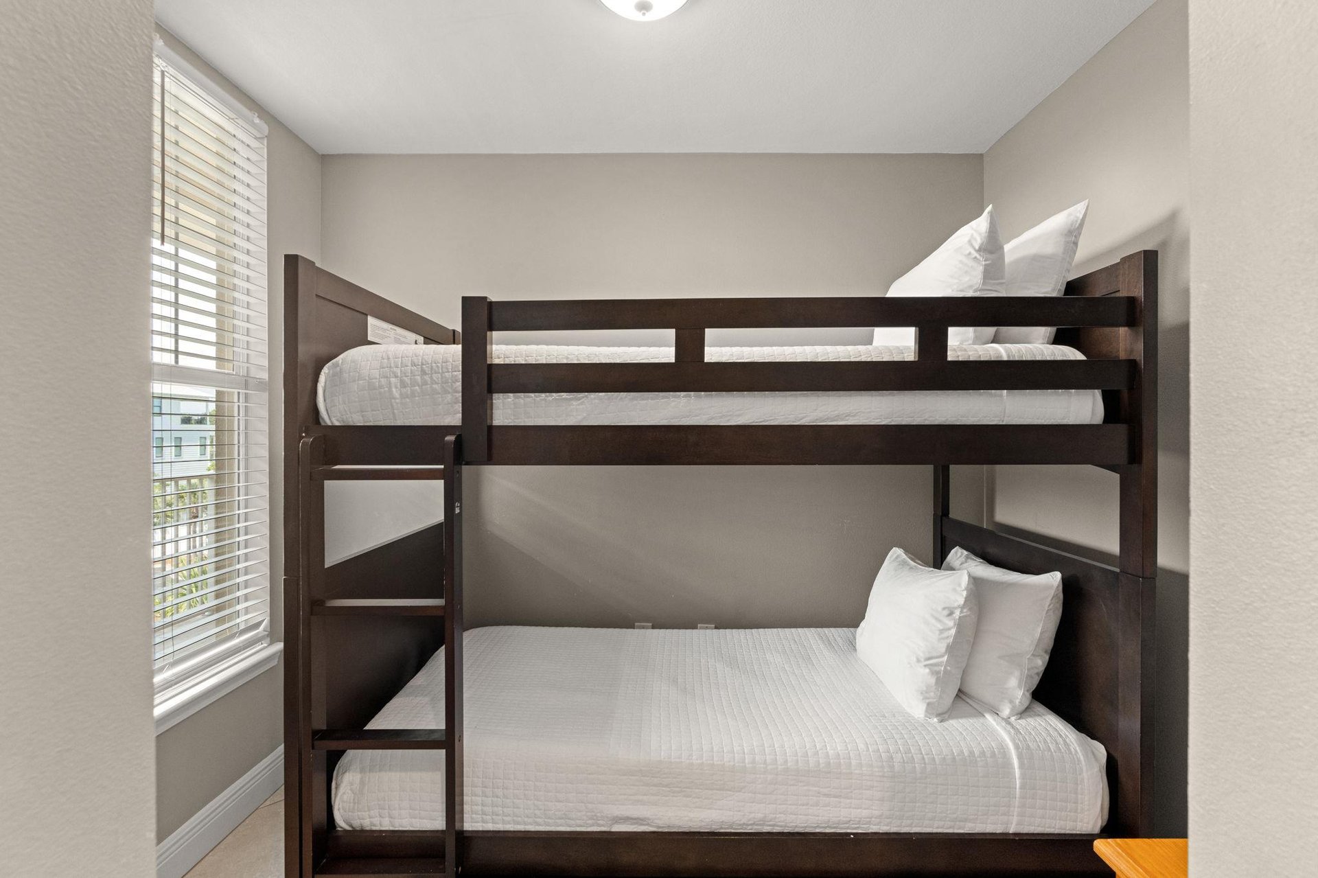 Your kids will love this cozy bunk room with plenty of natural light, perfect for restful nights after funfilled days.