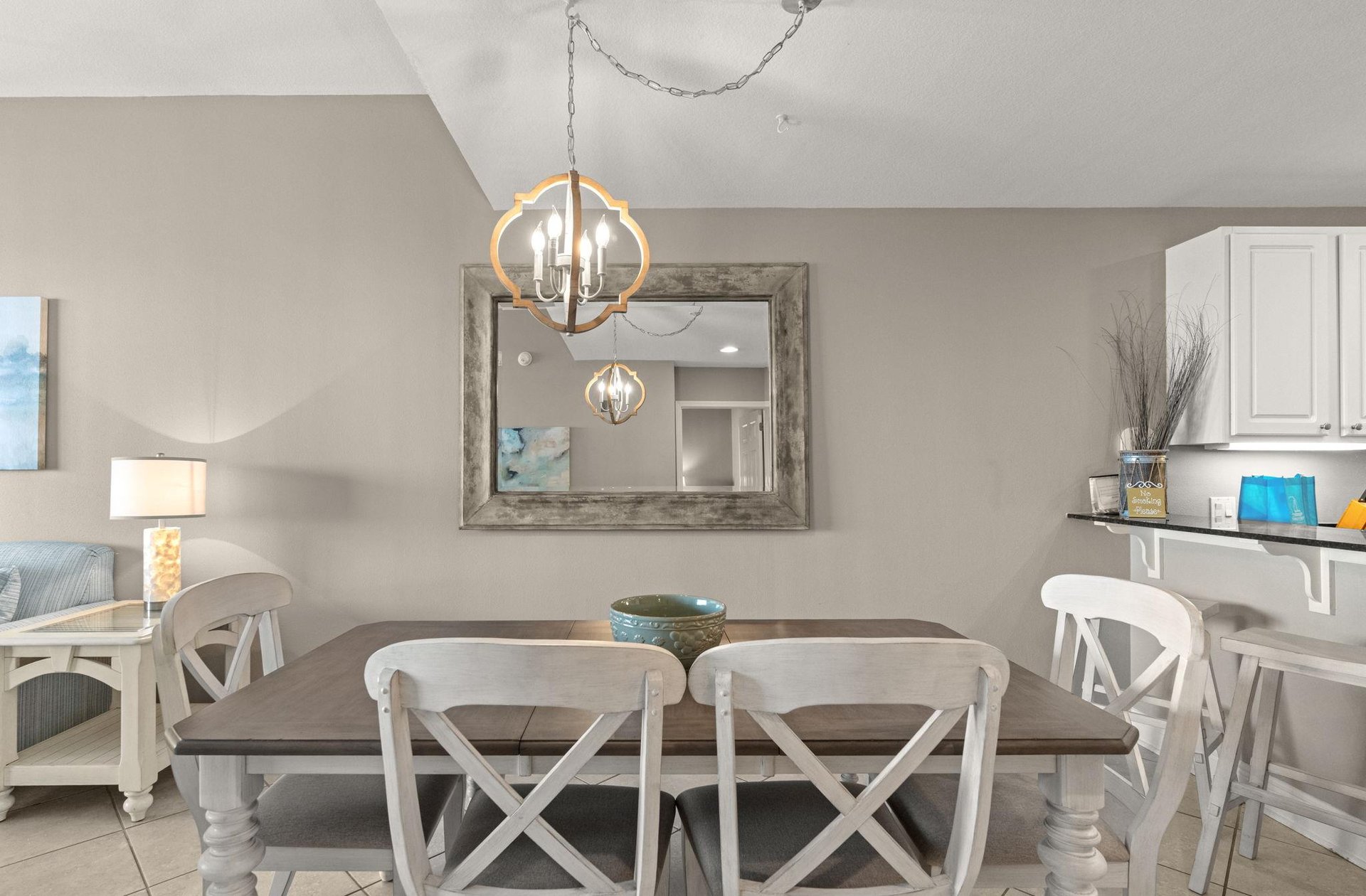 Gather around this welcoming dining space where your group can share meals and stories. 4 dining chairs and bench seating providing plenty of space for the whole family.