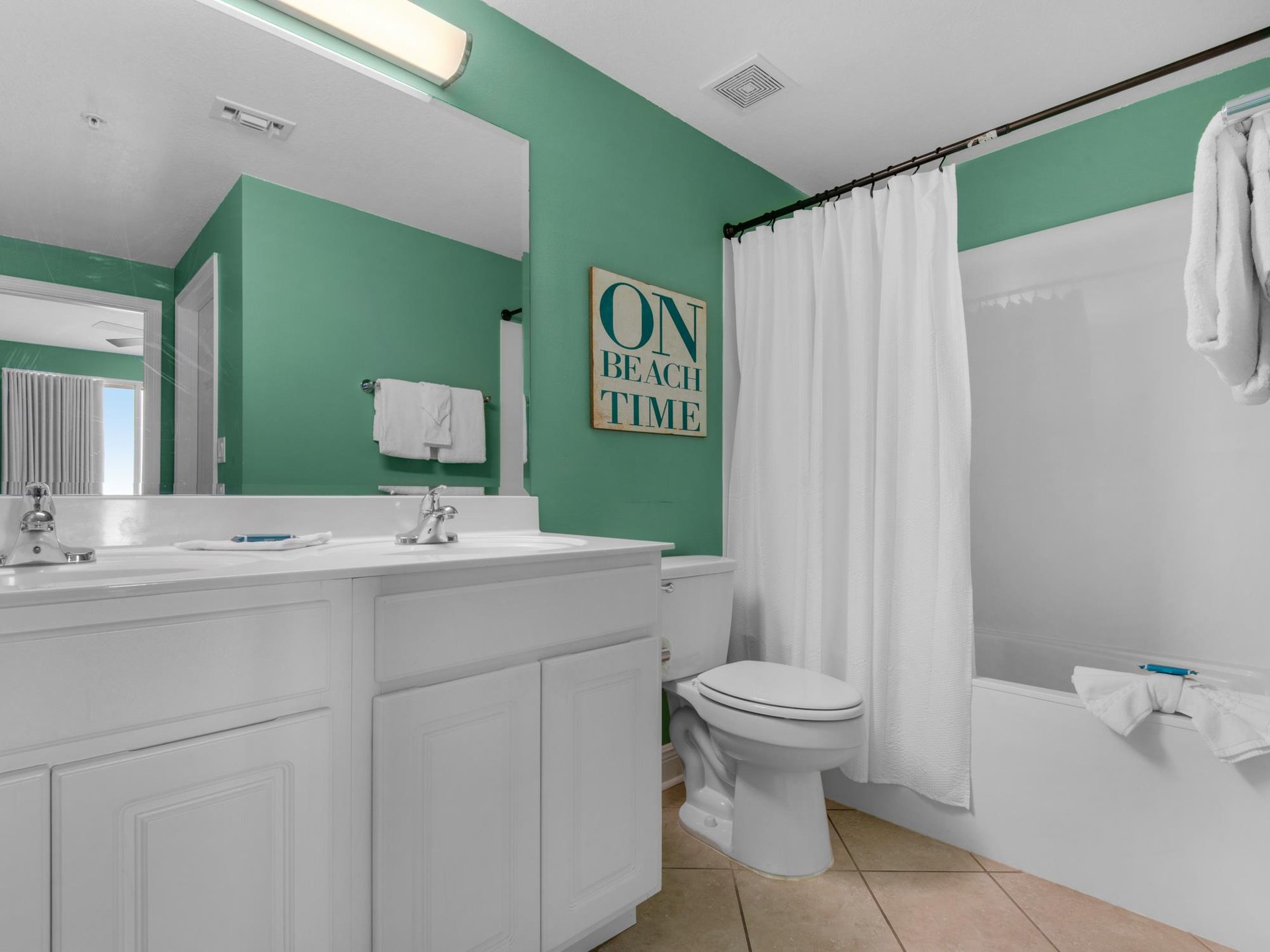 Primary Bathroom with Tub and Shower Combo