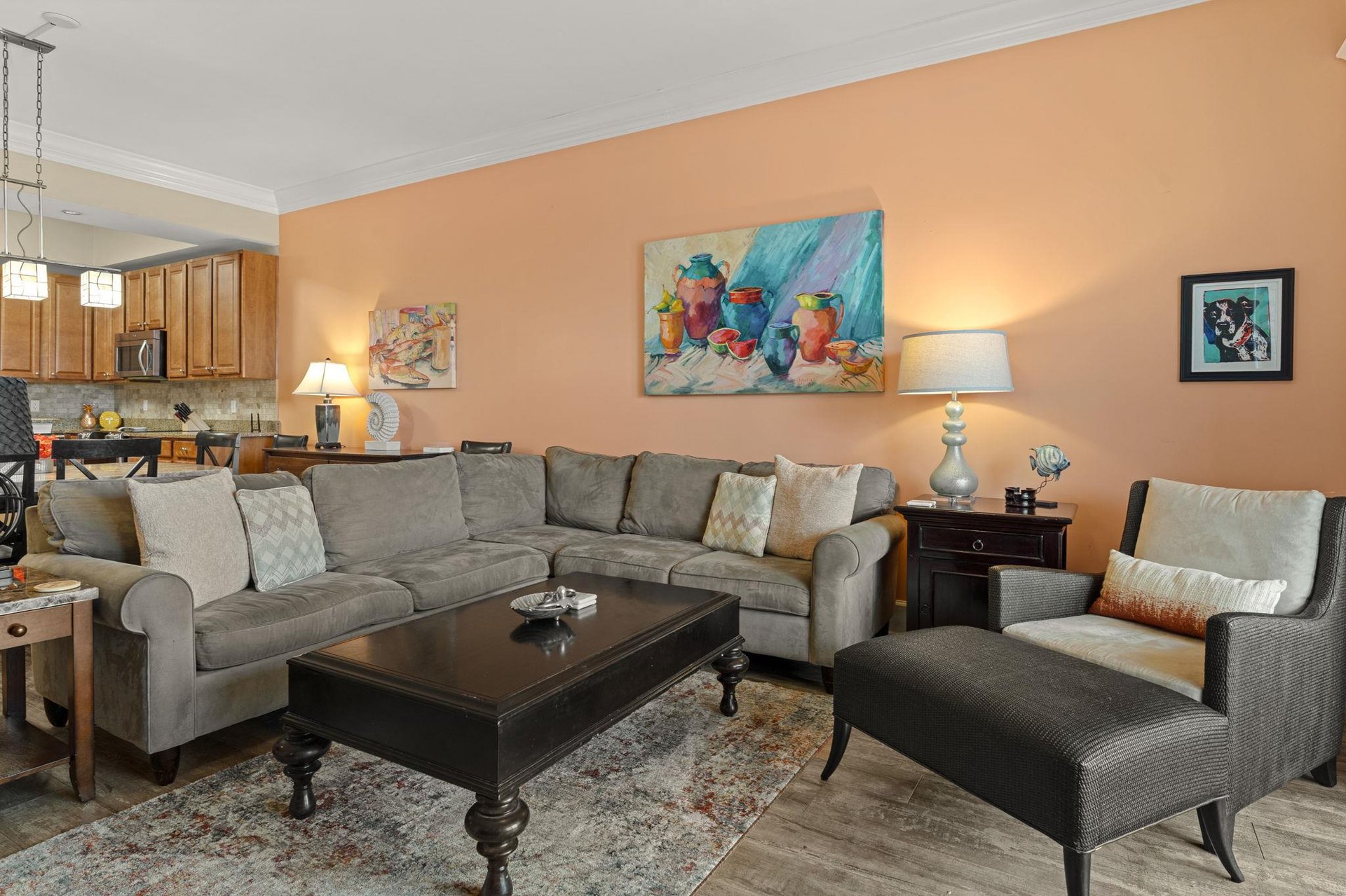 Openconcept living space, where warm tones and curated artwork create a relaxing retreat after your beach or lake adventures.