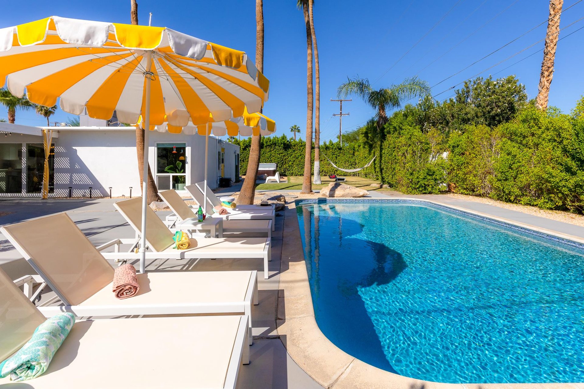Enjoy the Palm Springs lifestyle in this amazing pebble finish pool