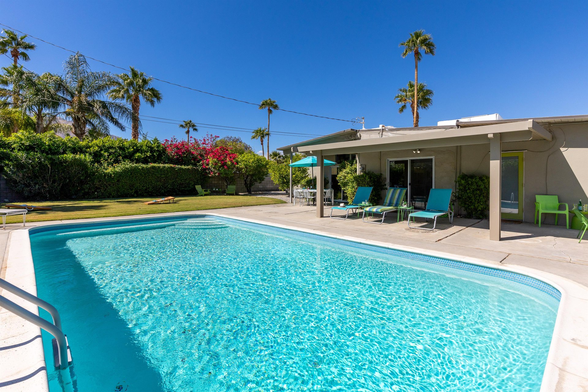 Shaded pool lounging chairs