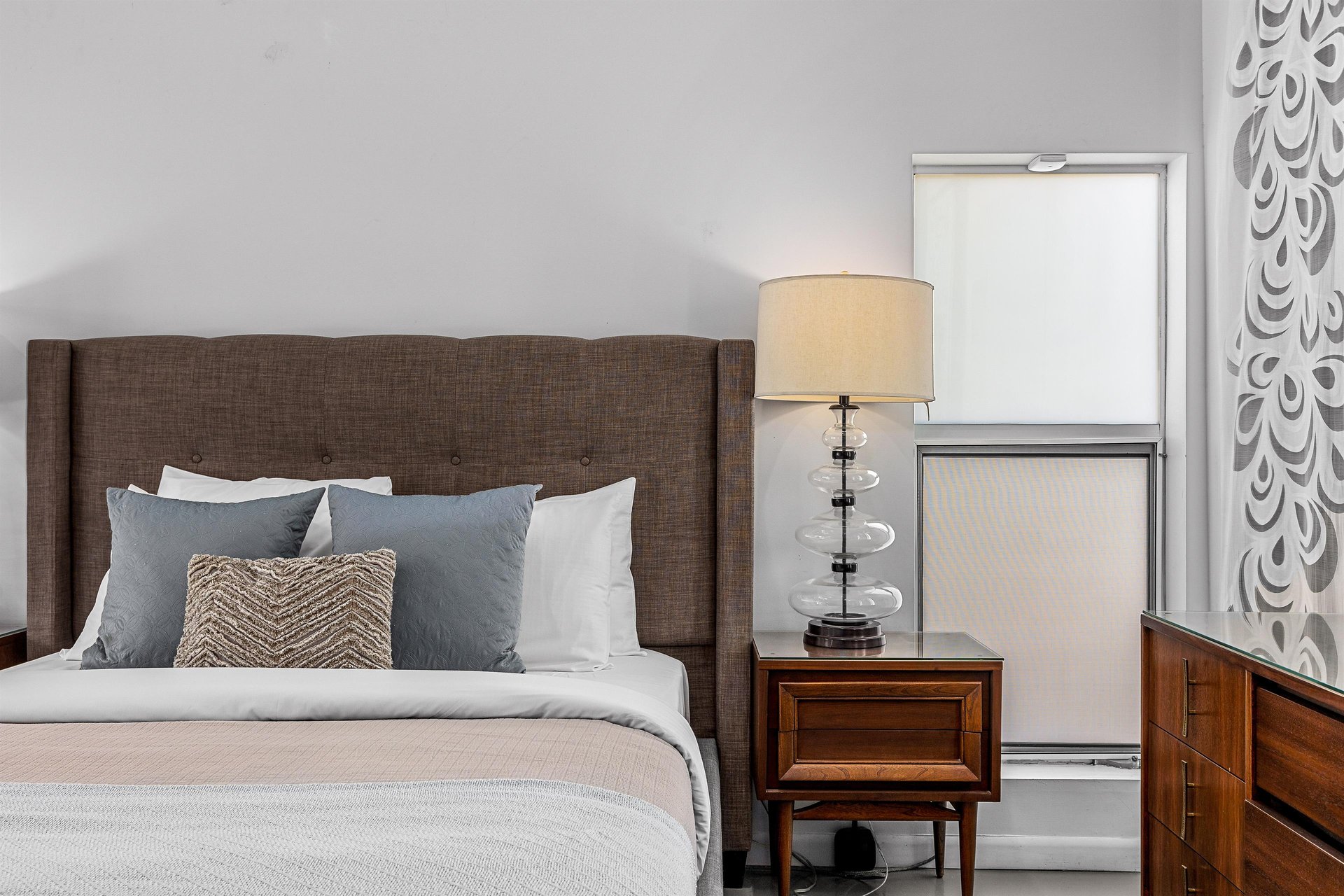 Nightstand with a stacked bubble lamp