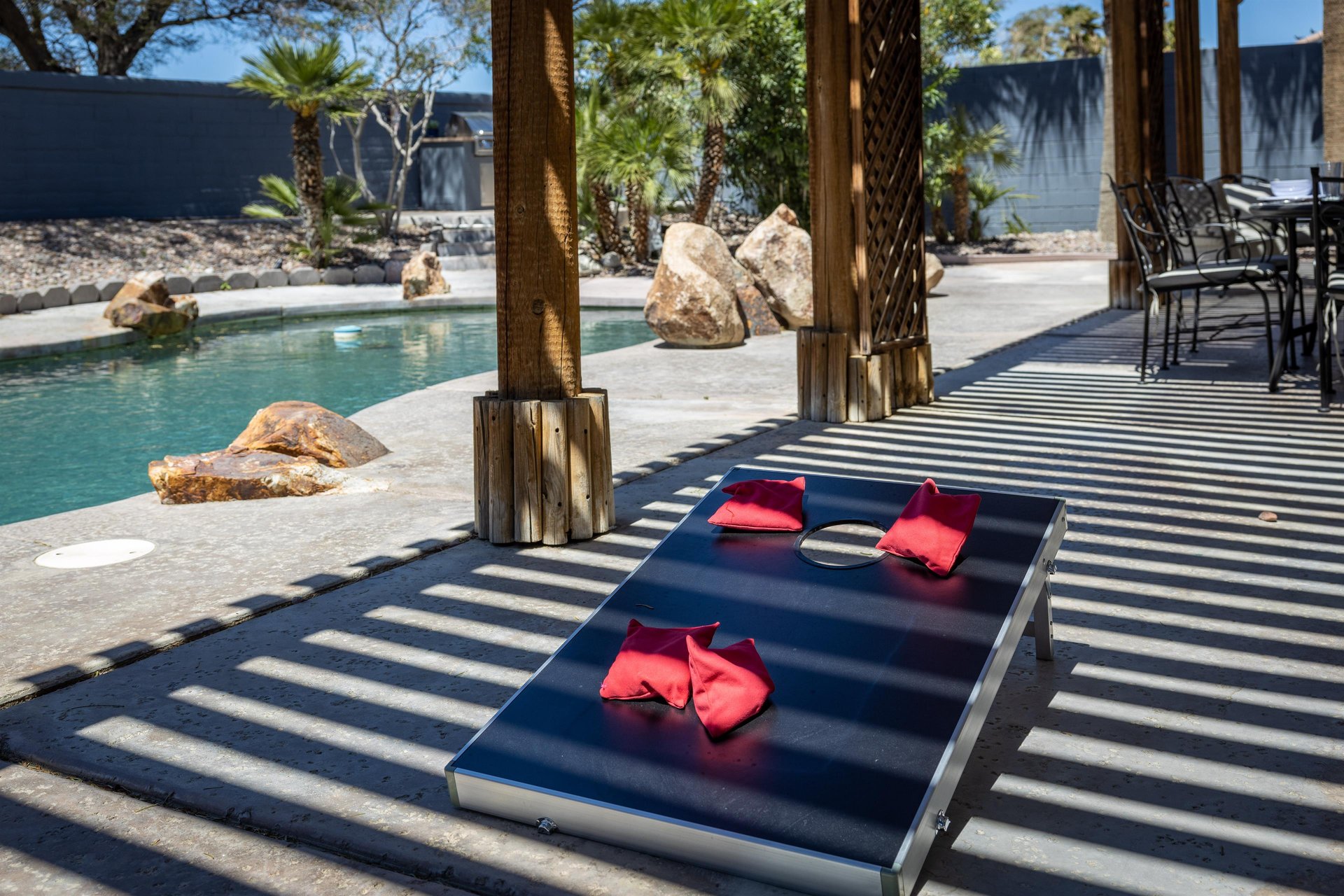 Play a game of cornhole