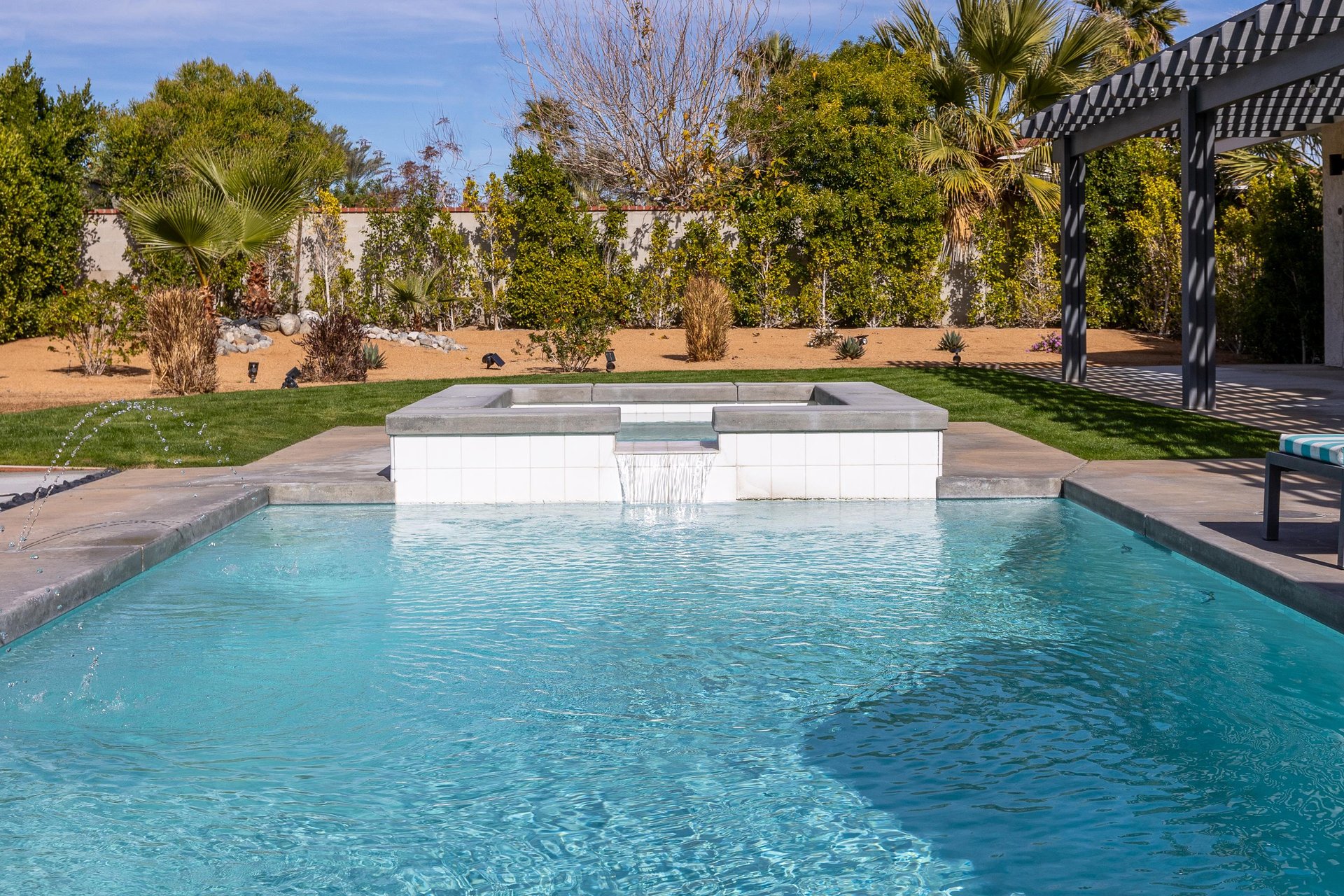 Spa with waterfall feature