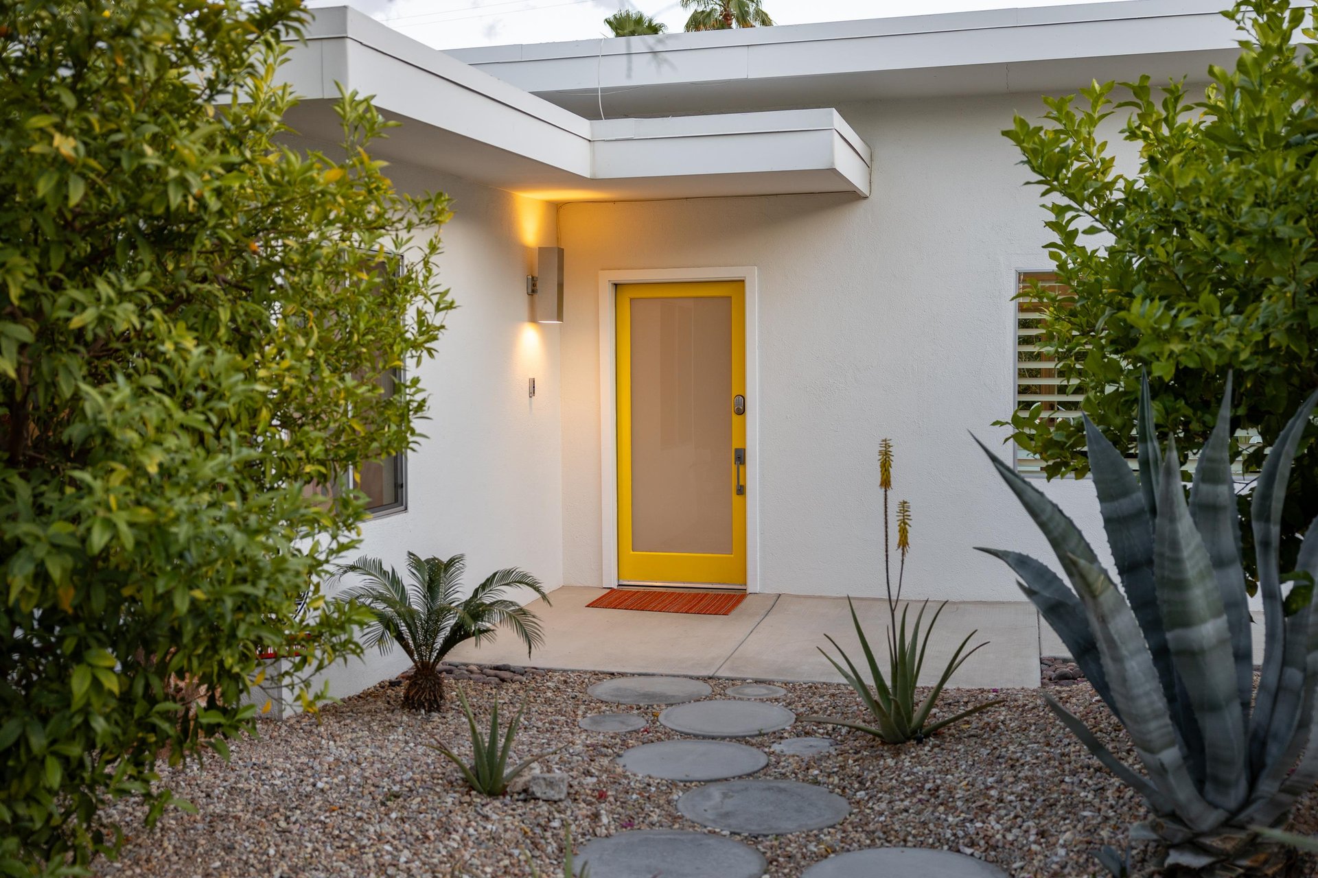 A welcoming yellow door