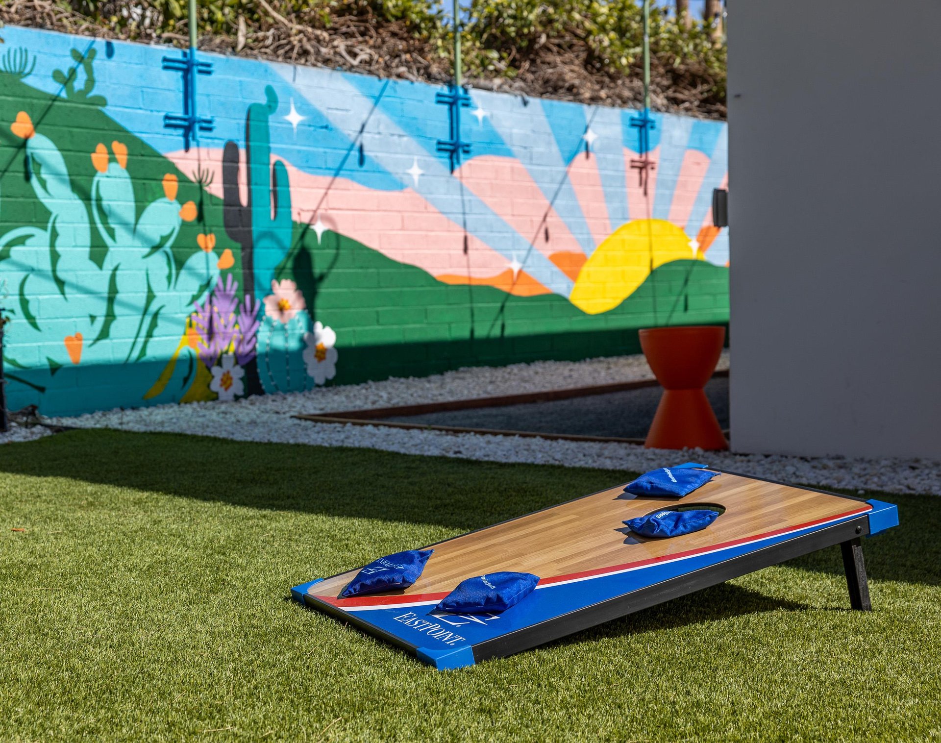 Play a game of cornhole with the family