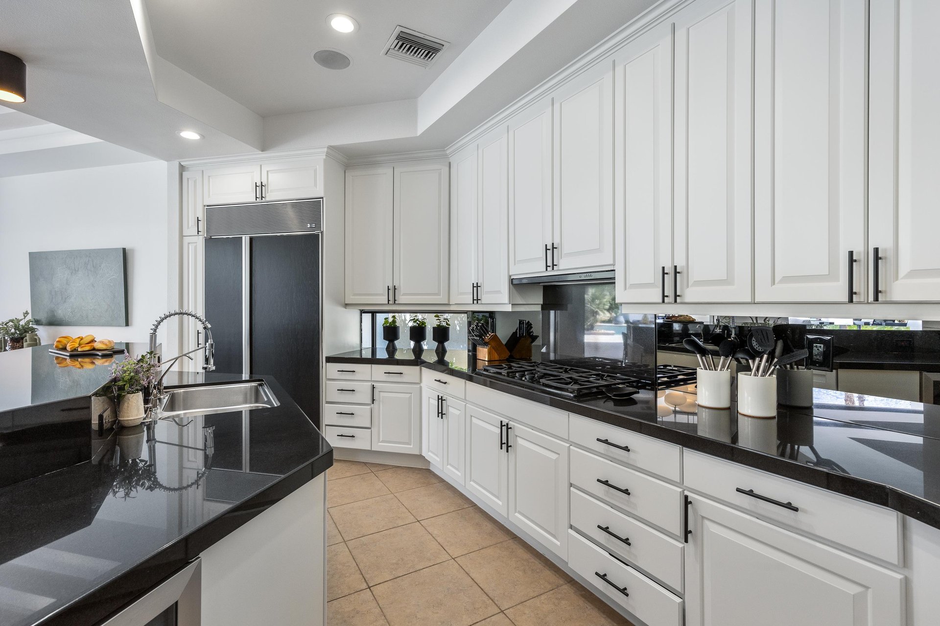Clean white cabinetry with all the amenities you need