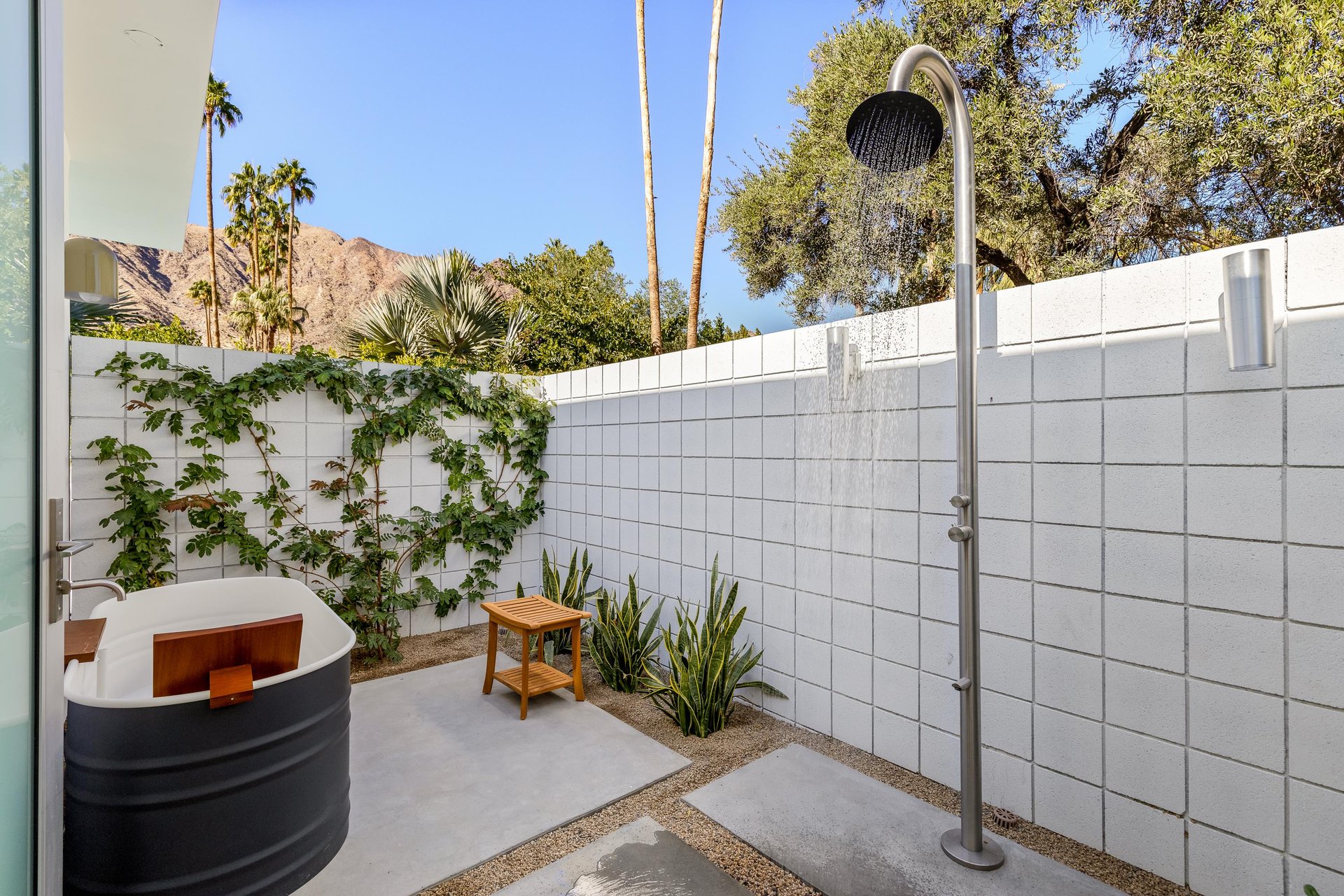 Bonus outdoor tub and shower outside the Primary Bedroom