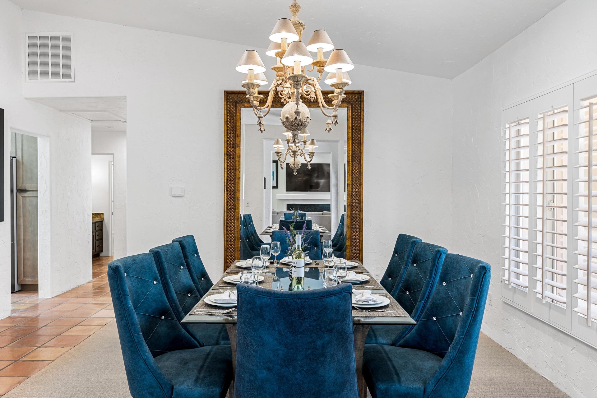 Luxurious blue chairs at this dining table
