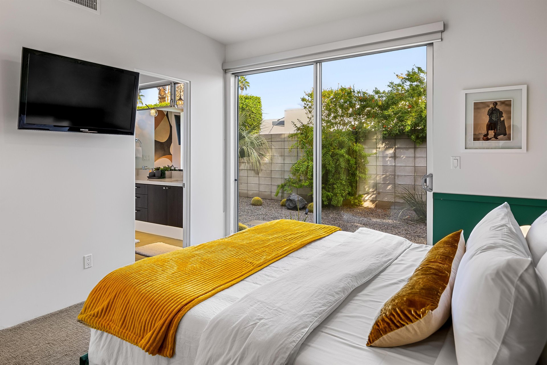 Green room open to patio and bath