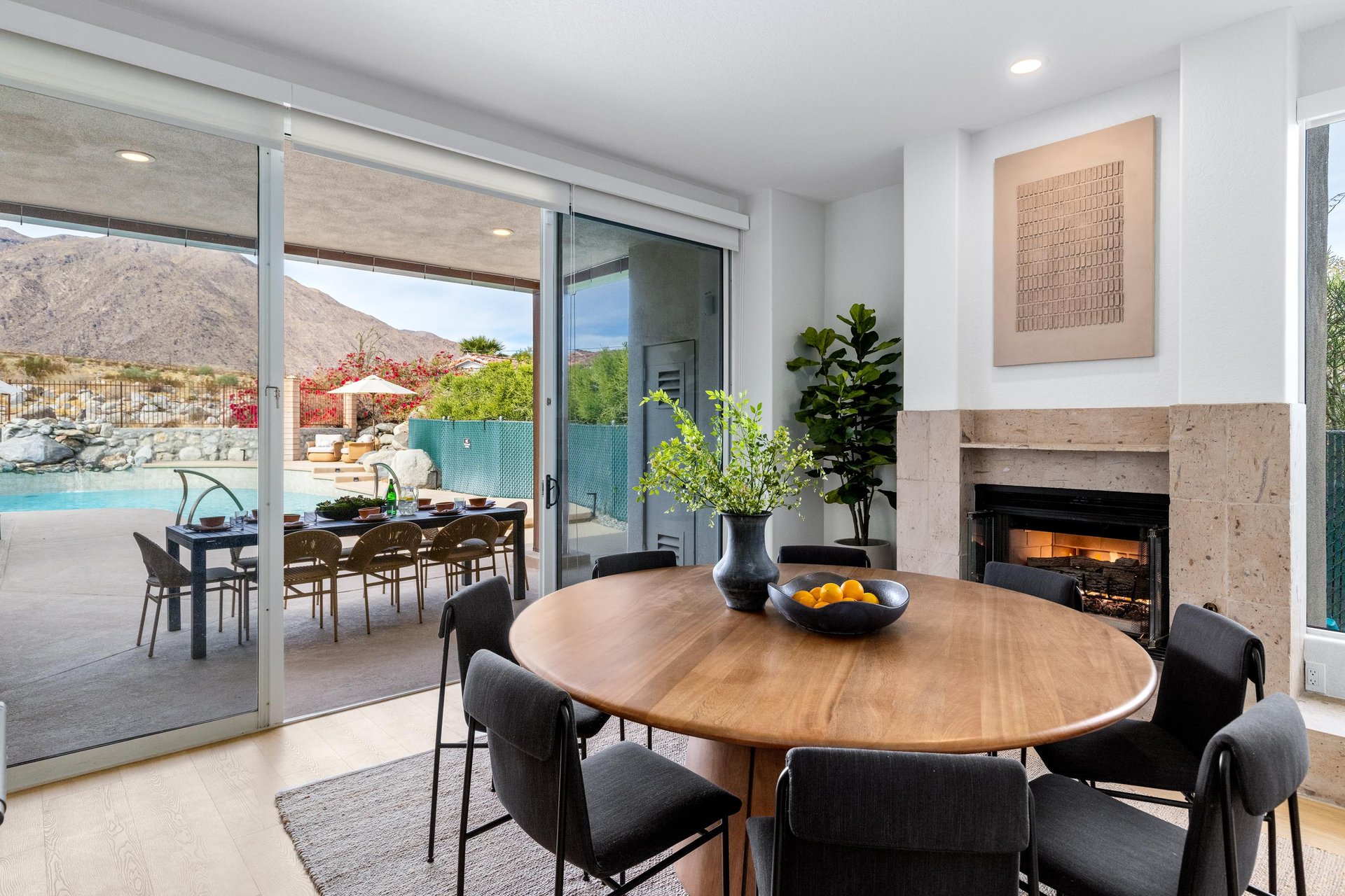 Dining for 8 next to yet another fireplace