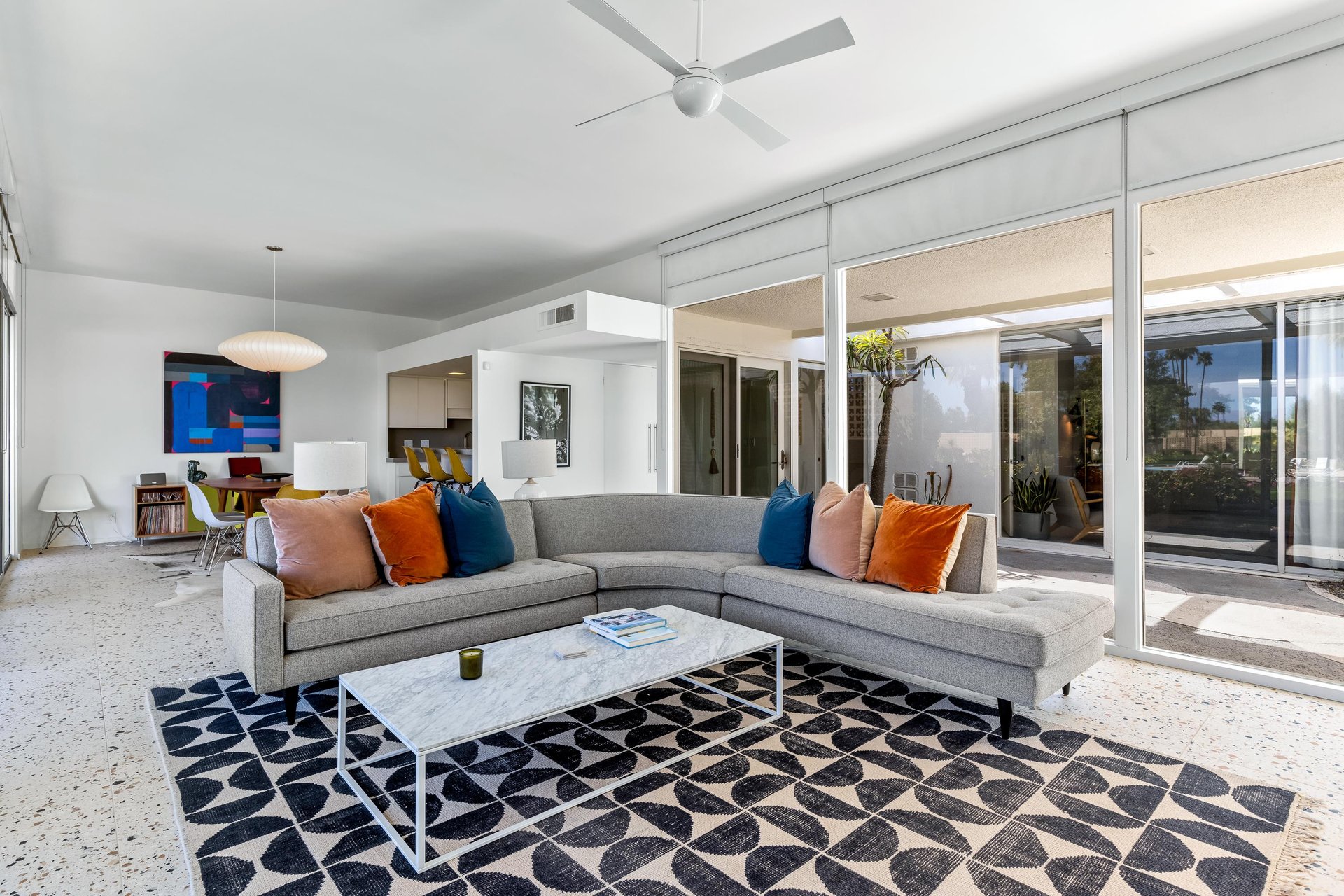 Comfy midcentury modern furnishings throughout