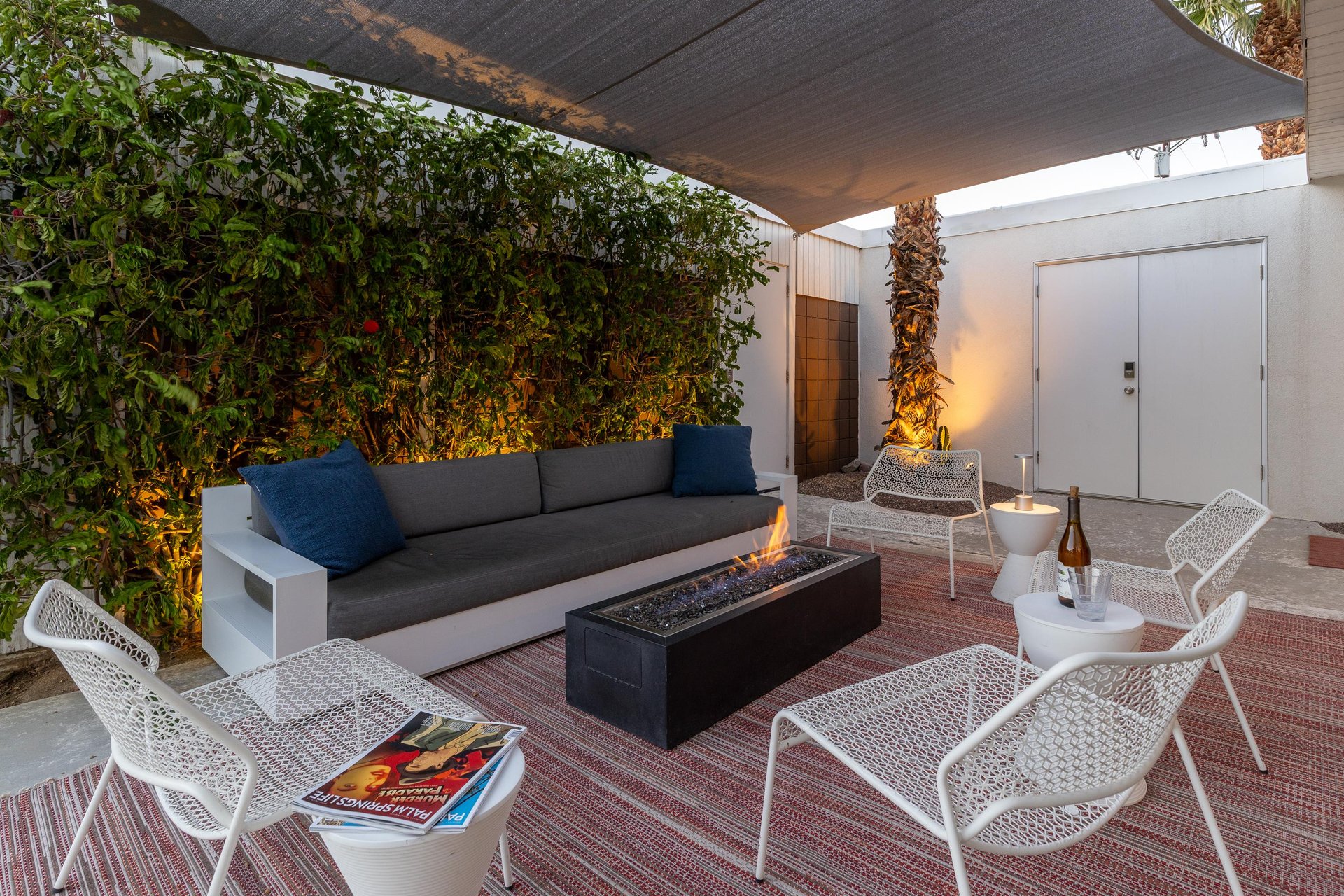 Gather around with the fire pit with a glass of wine