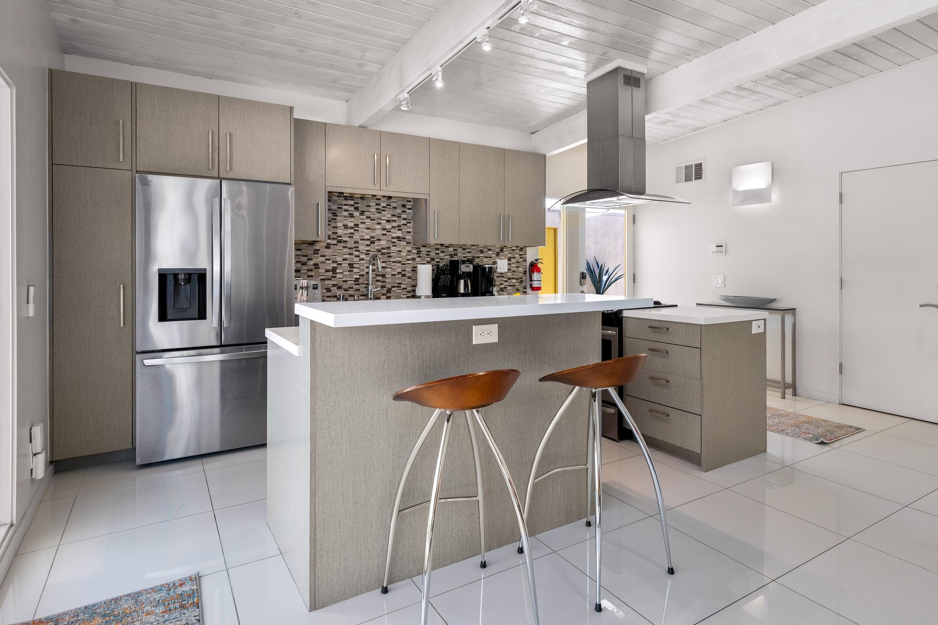Modern kitchen with breakfast bar for three
