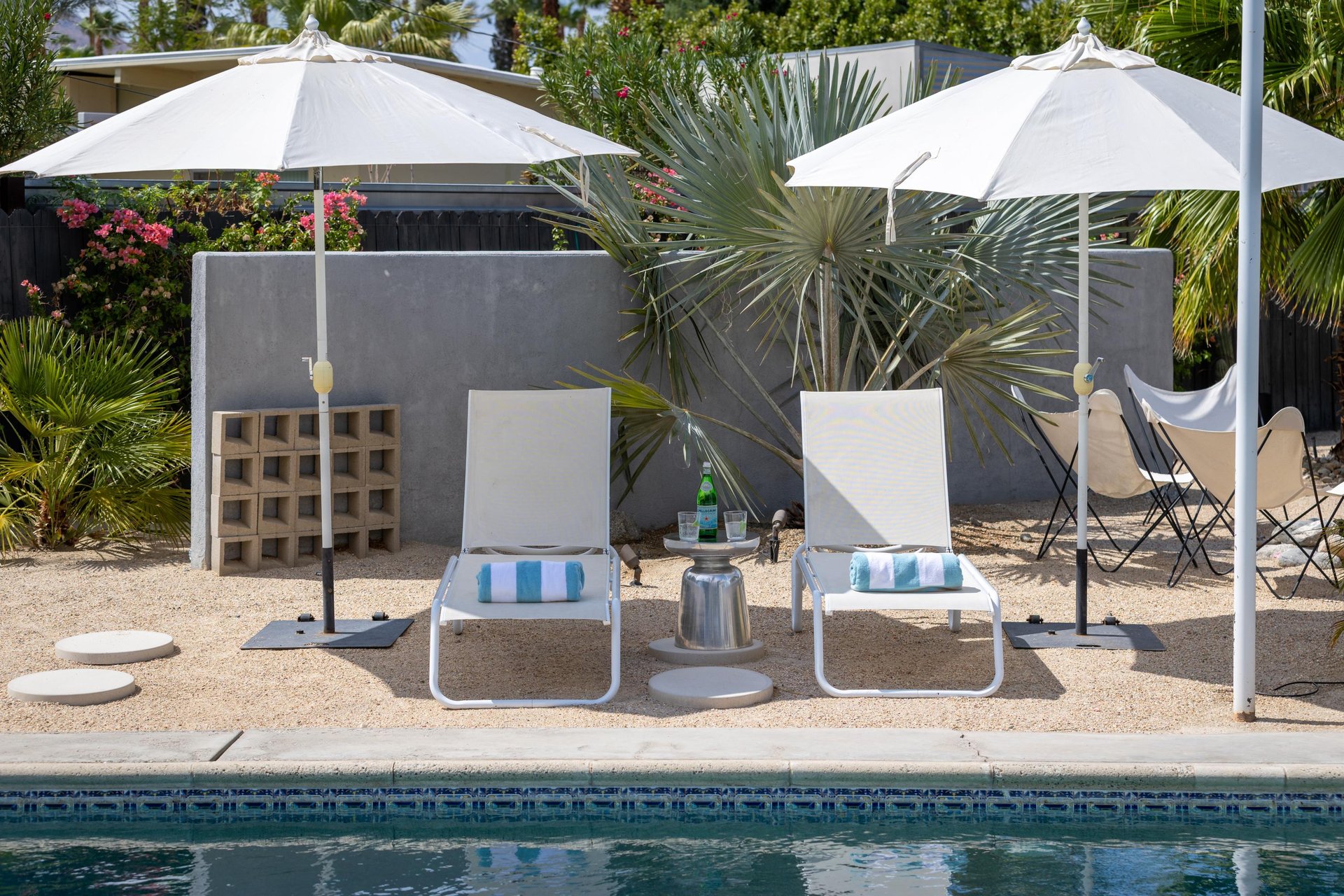 Sip on a cool beverage relaxing by the pool