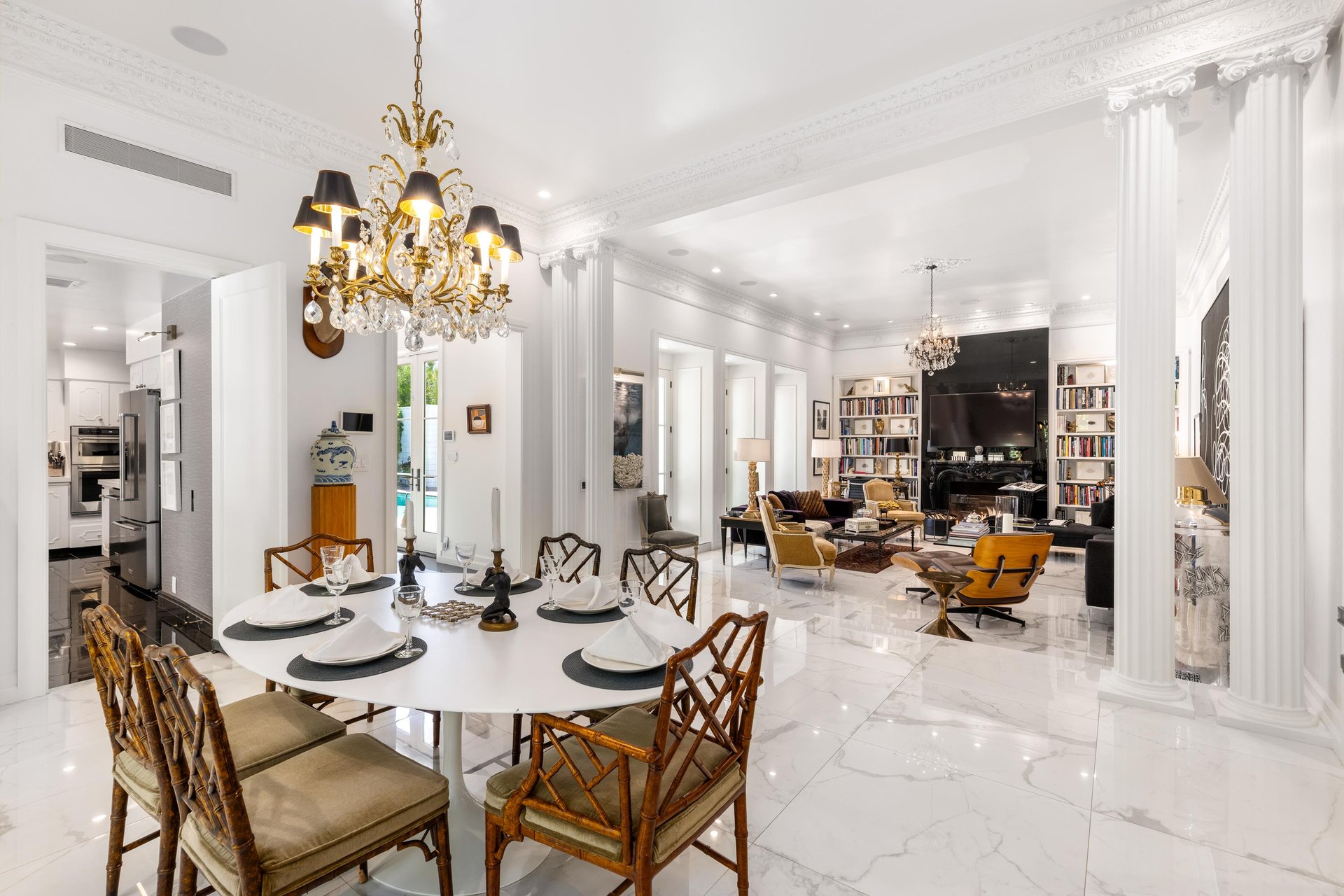 View from the dining room to the living room and kitchen