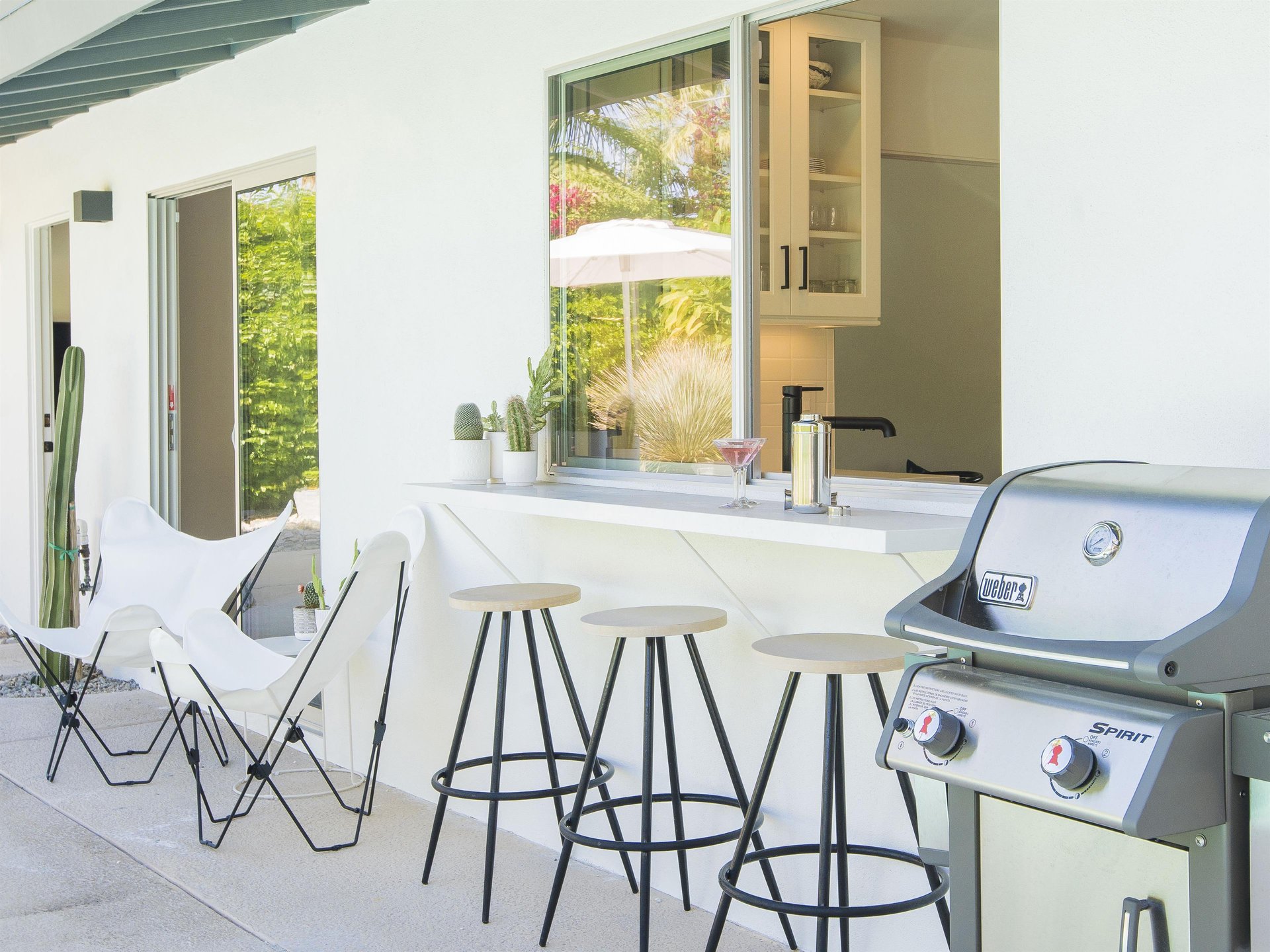 Enjoy a cocktail while relaxing poolside