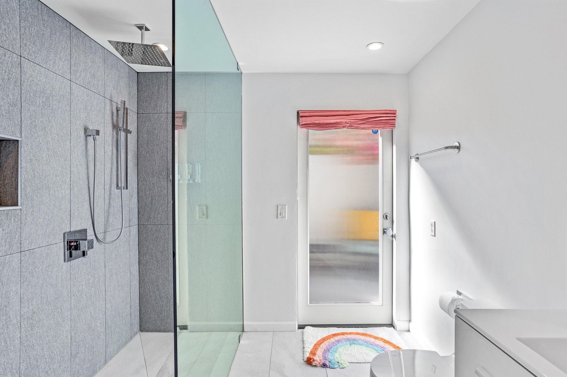 Casita bathroom with outdoor access to cute private patio