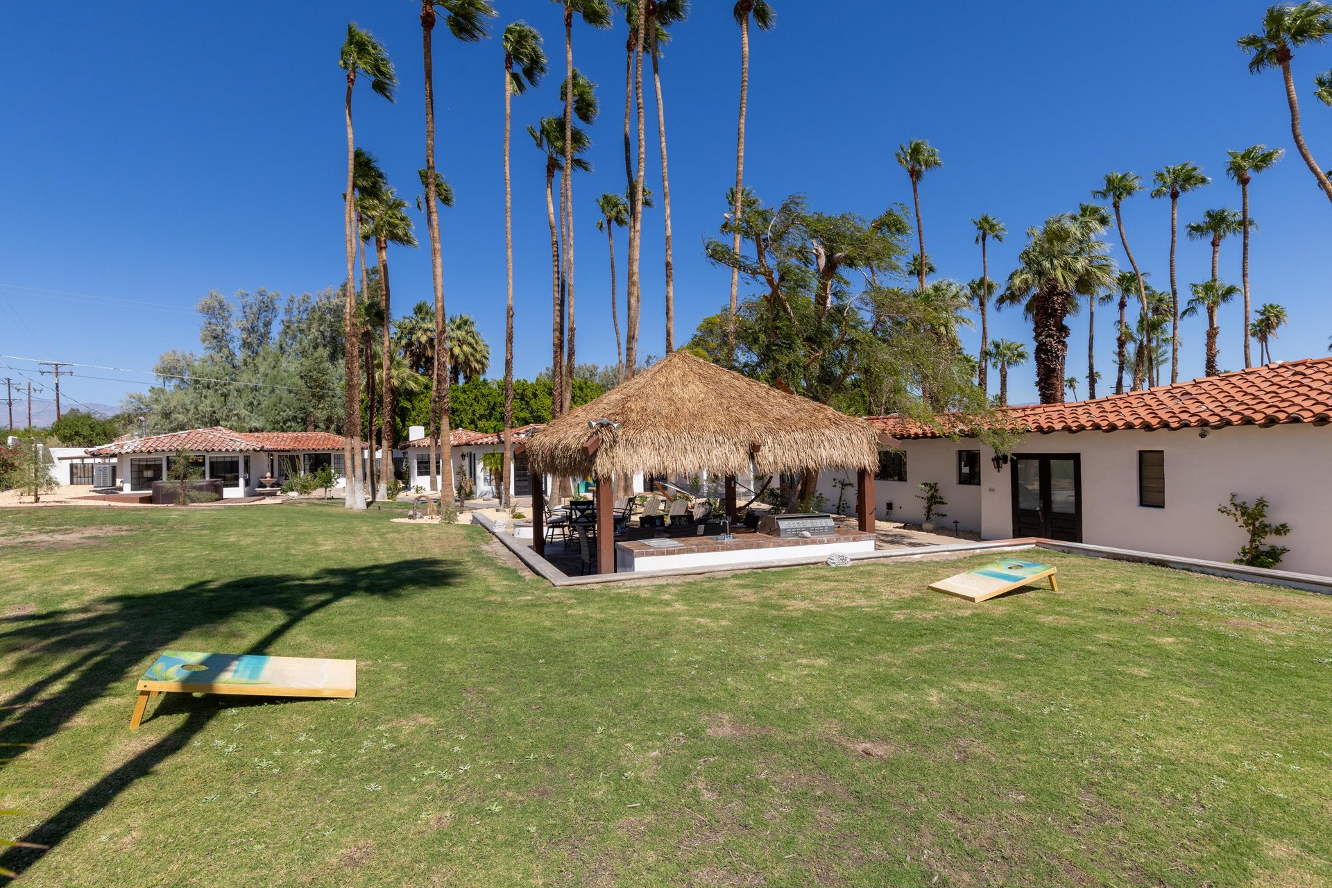 View of the outdoor kitchen and yard