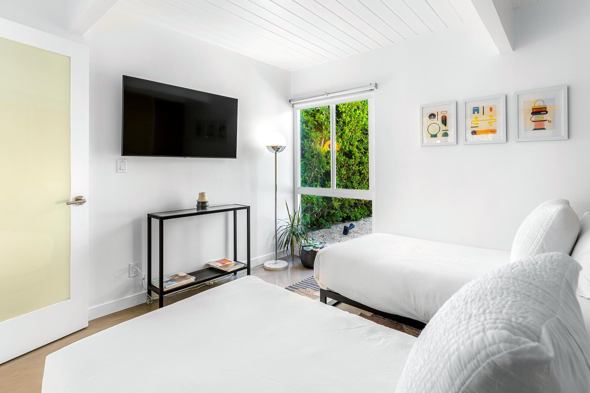 Guest bedroom with access to the yard