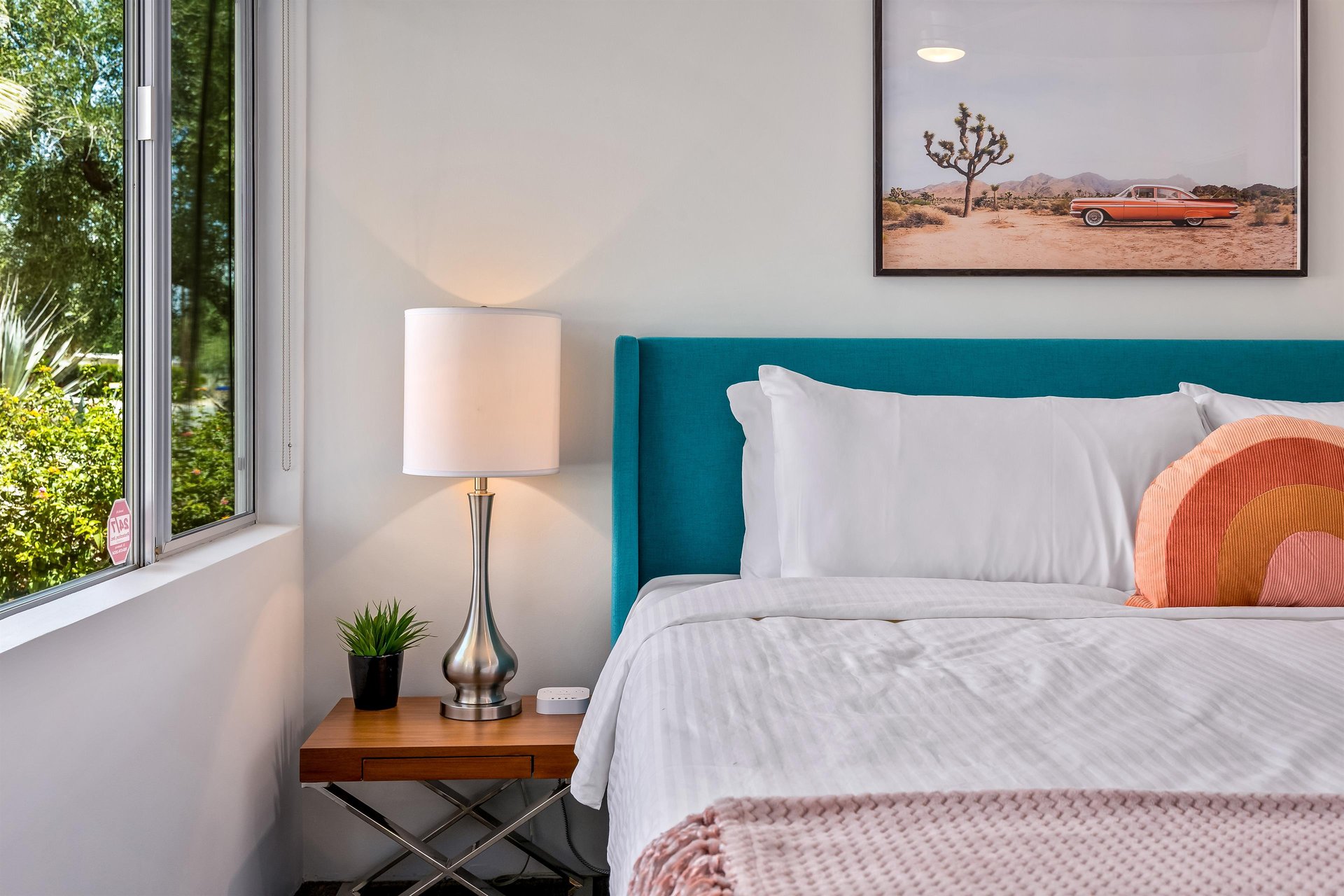 Nightstand with plant and lamp